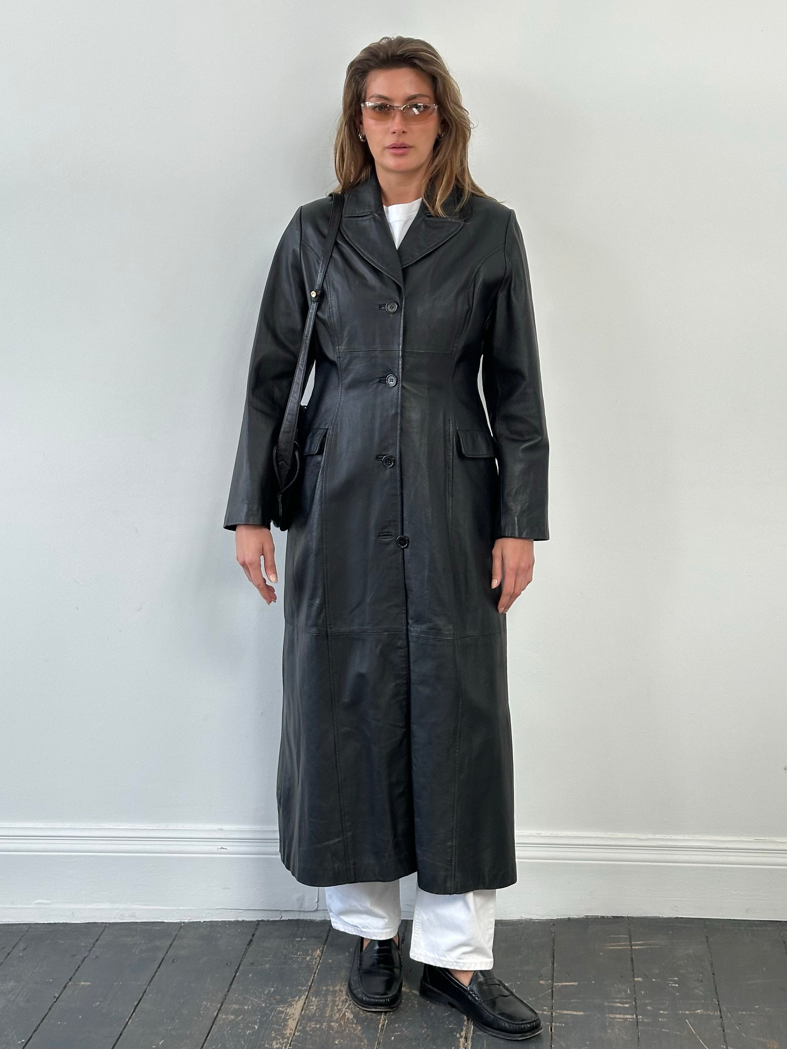 Vintage 1980s leather trench coat, floor-length, size M, featuring classic design and rich leather texture.