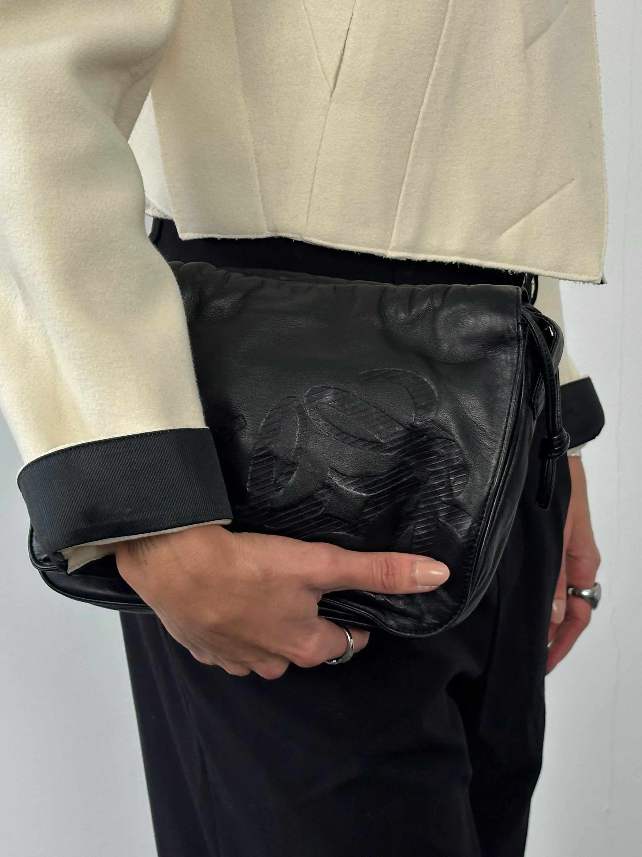 Loewe 1990s ruched leather Anagram crossbody bag with adjustable strap and signature logo detail.