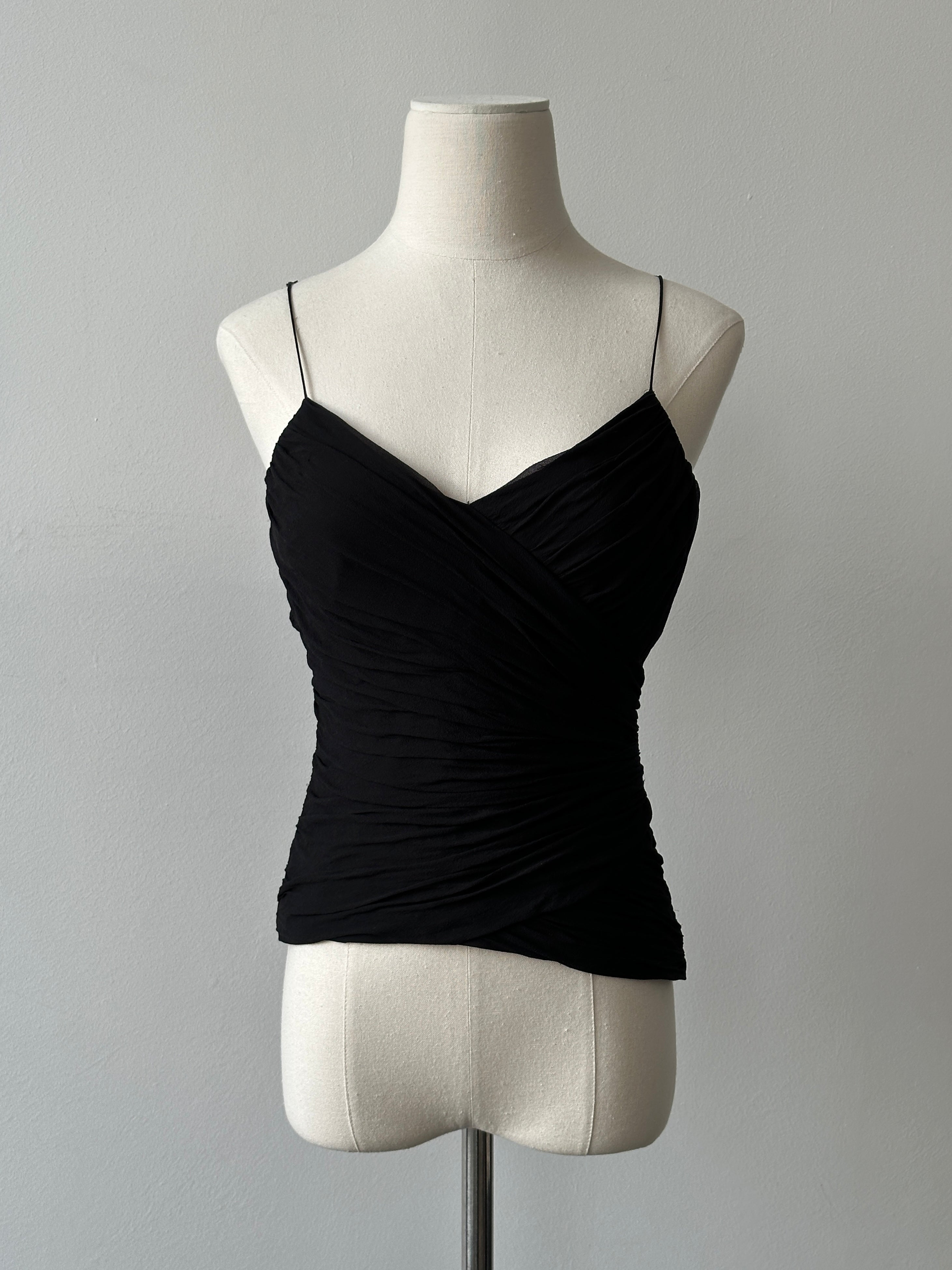Vintage 2000s pure silk top in size S, featuring a smooth, shiny fabric and classic design, displayed on a hanger.