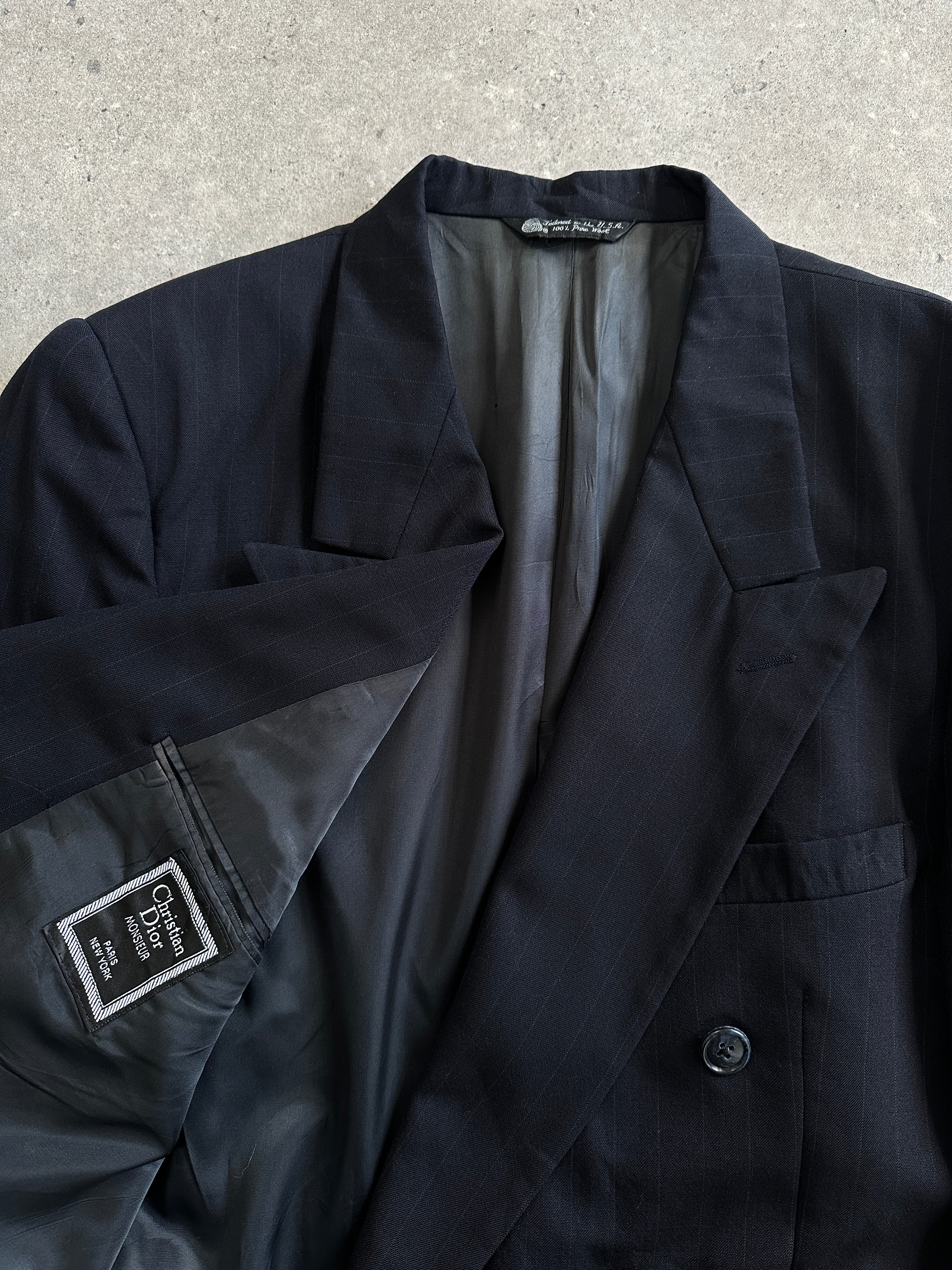 Christian Dior Monsieur 1980s pure wool double-breasted blazer in size 44R/XXL, shown on a hanger with structured lapels.