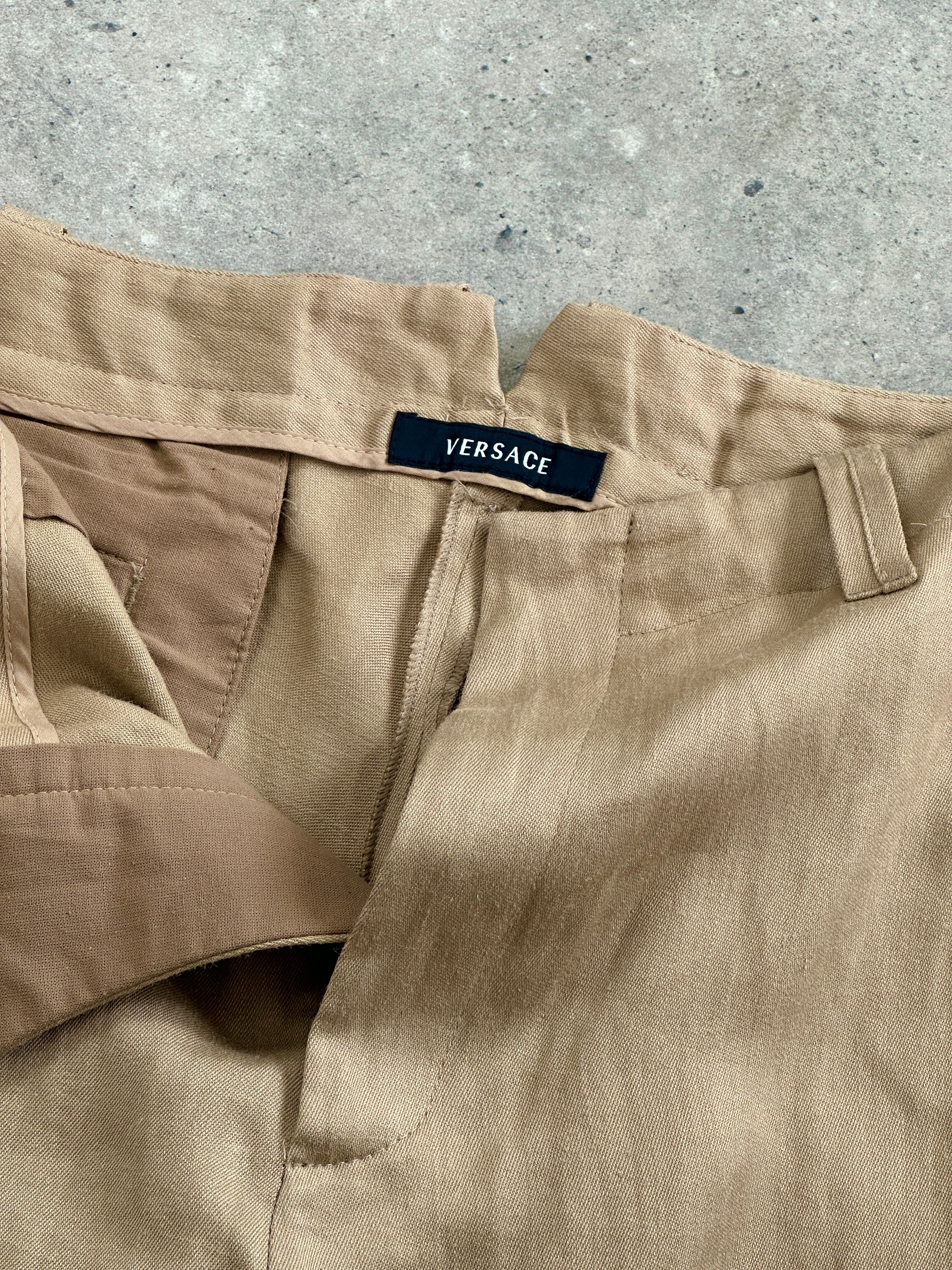 Versace 1990s pure ramie wide-leg trousers in size W34, beige color, featuring a relaxed fit and classic high-waist design.