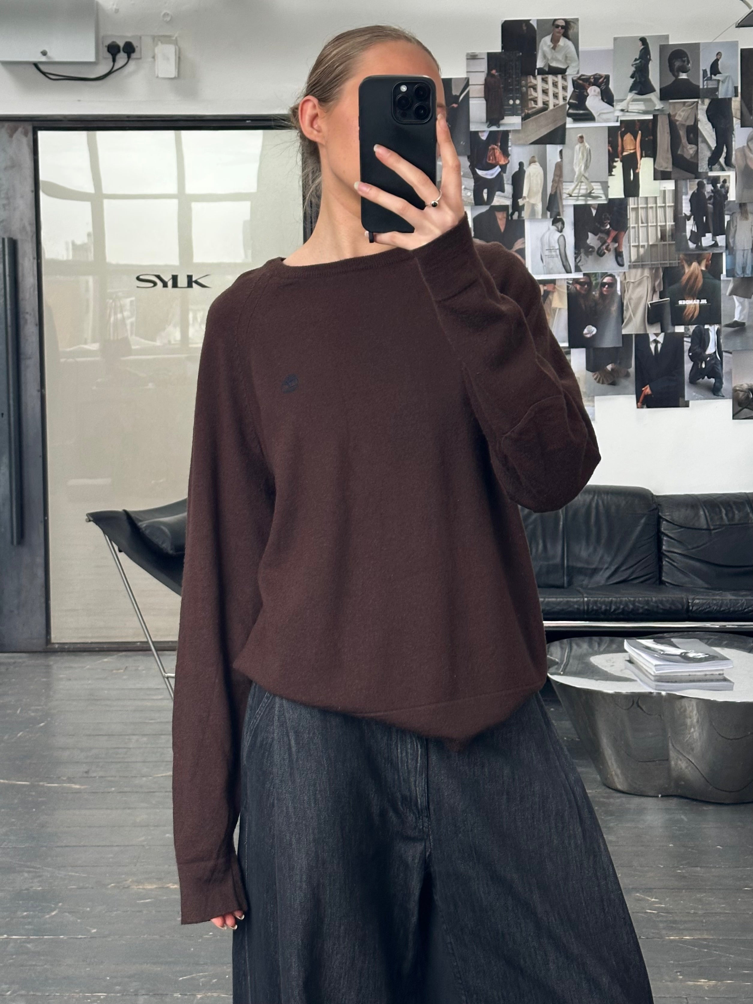Timberland 2000s Pure Wool Knitted Logo Jumper in size M/L, showing the wool knit fabric and Timberland logo on the front.