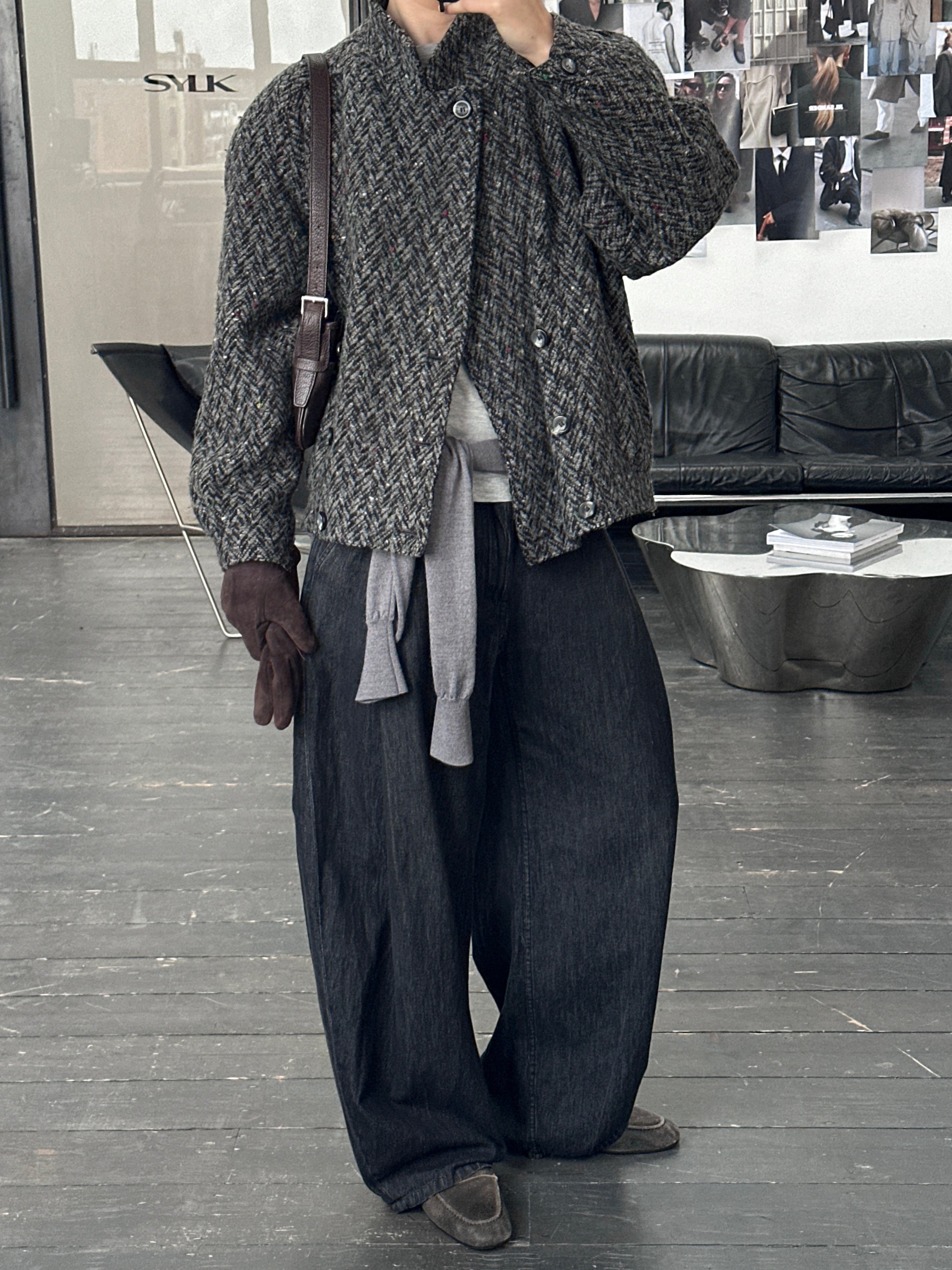 Vintage 1990s wool high-neck bomber jacket in size M, featuring a classic retro style and textured wool fabric.