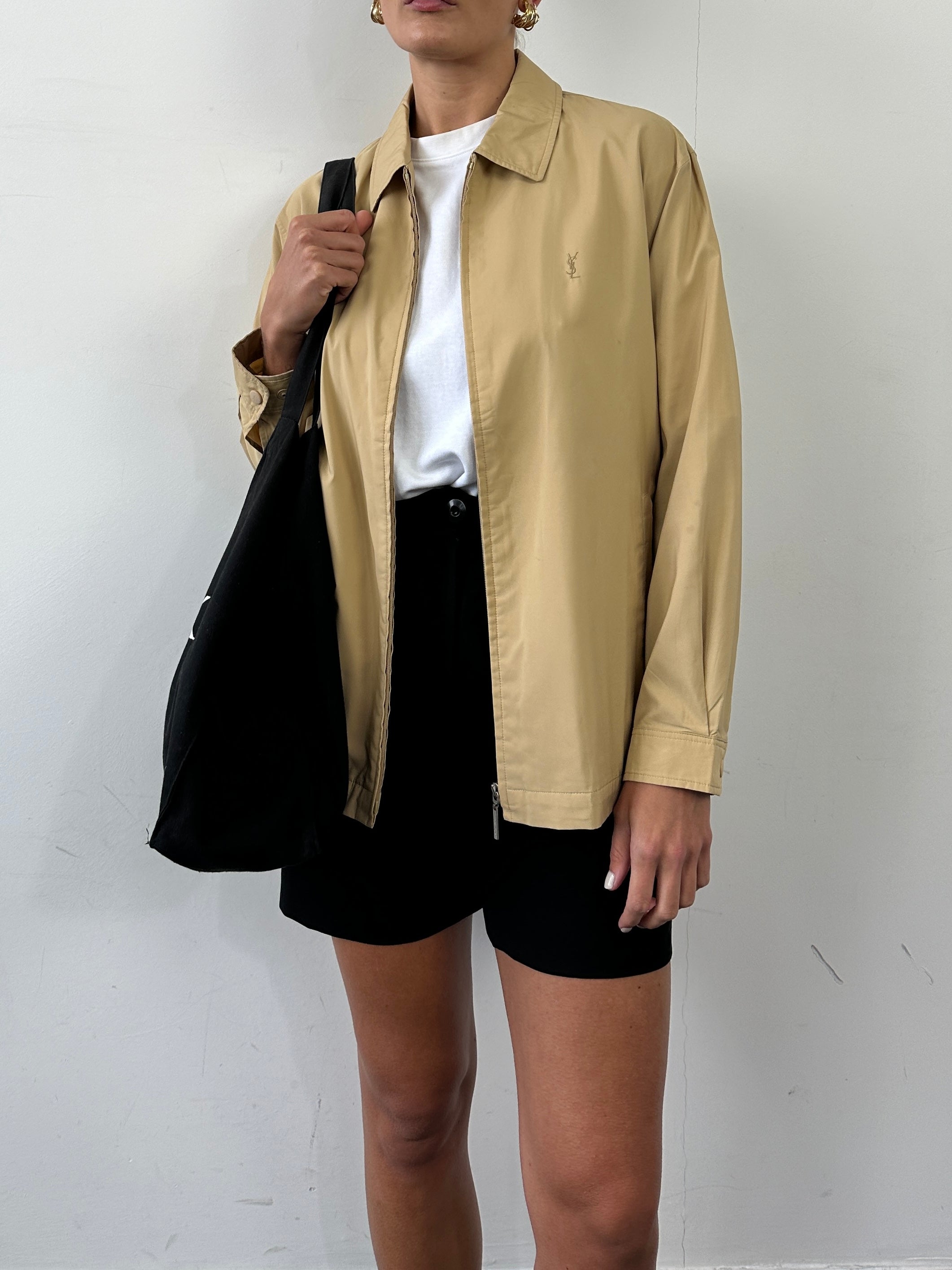 Yves Saint Laurent Pour Homme showerproof logo bomber jacket in size L, featuring a sleek design and brand logo detail.