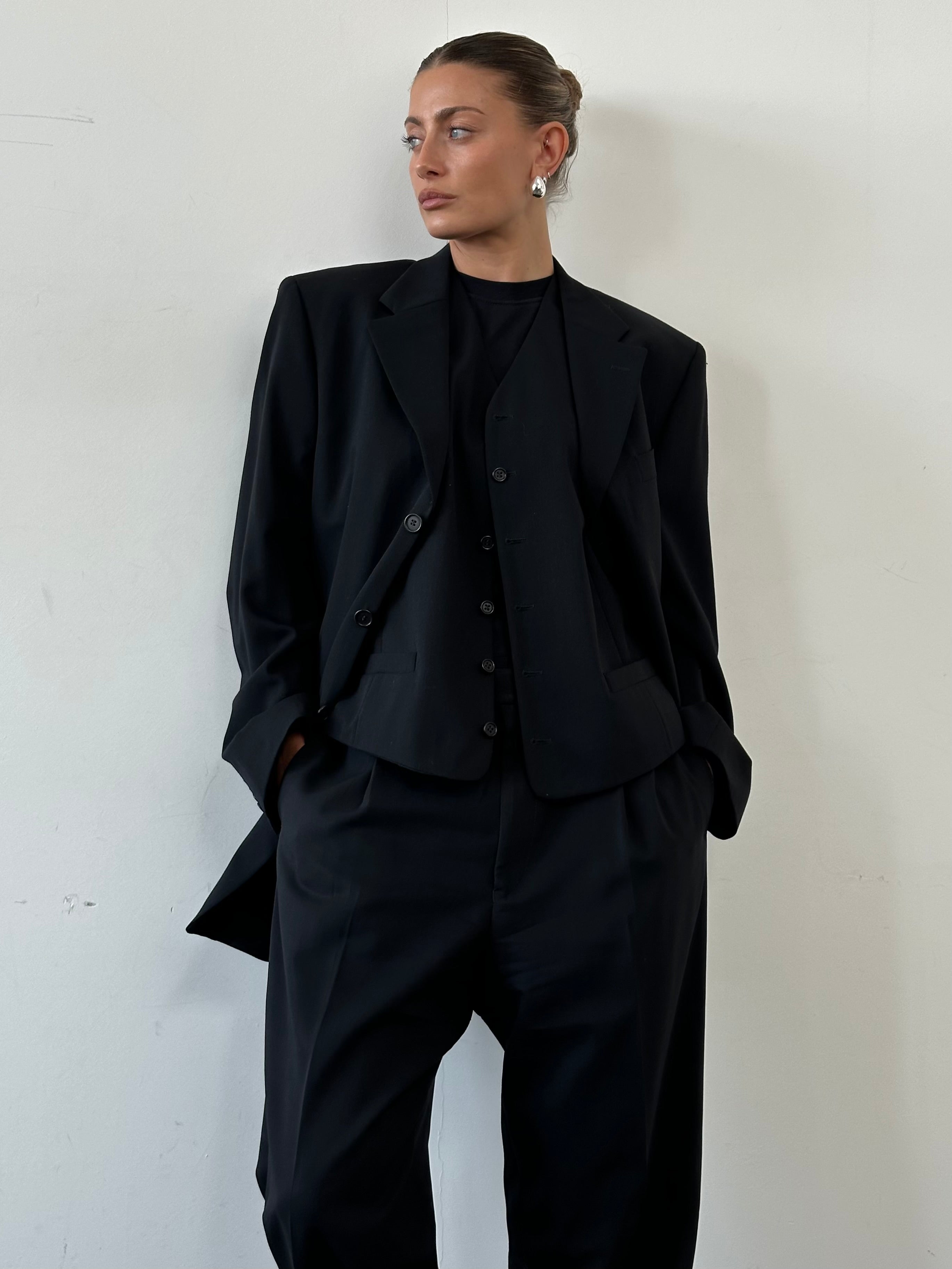 Yves Saint Laurent Pour Homme pure wool three-piece suit in size 40L/W32, tailored fit with classic lapel jacket, vest, and trousers