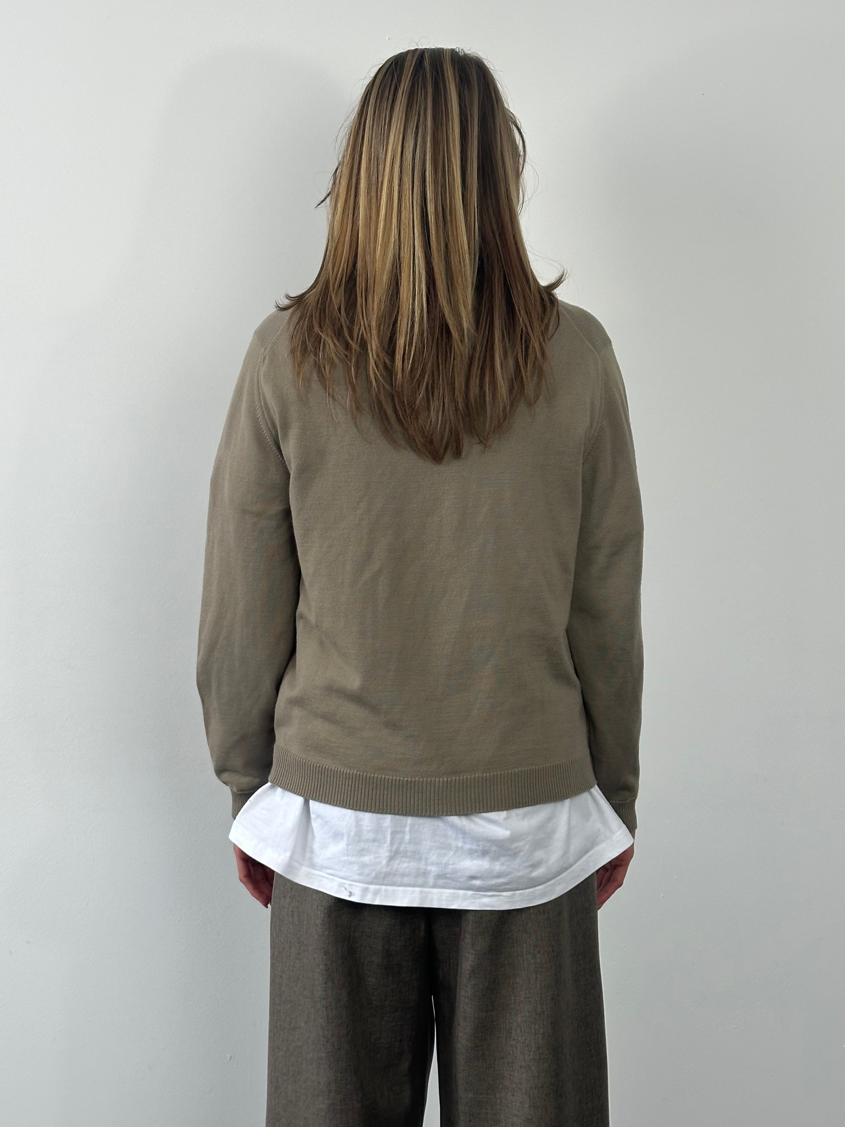Yves Saint Laurent 1990s wool knit logo jumper in size M, featuring the iconic brand logo on a cozy, patterned sweater.