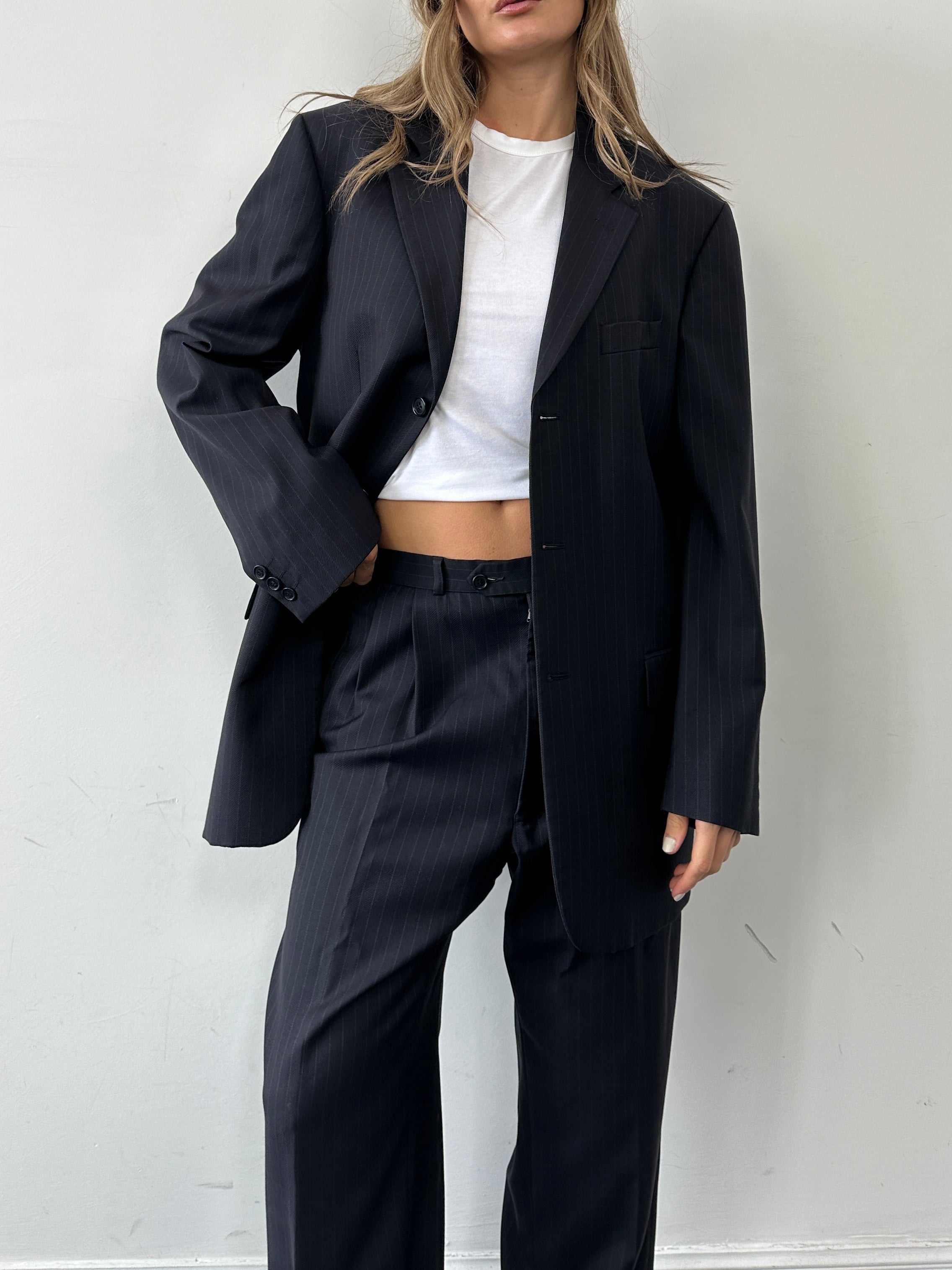 Balmain Pierre Balmain pinstripe pure wool single-breasted suit jumpsuit in size 40L/W32, shown in a front view.