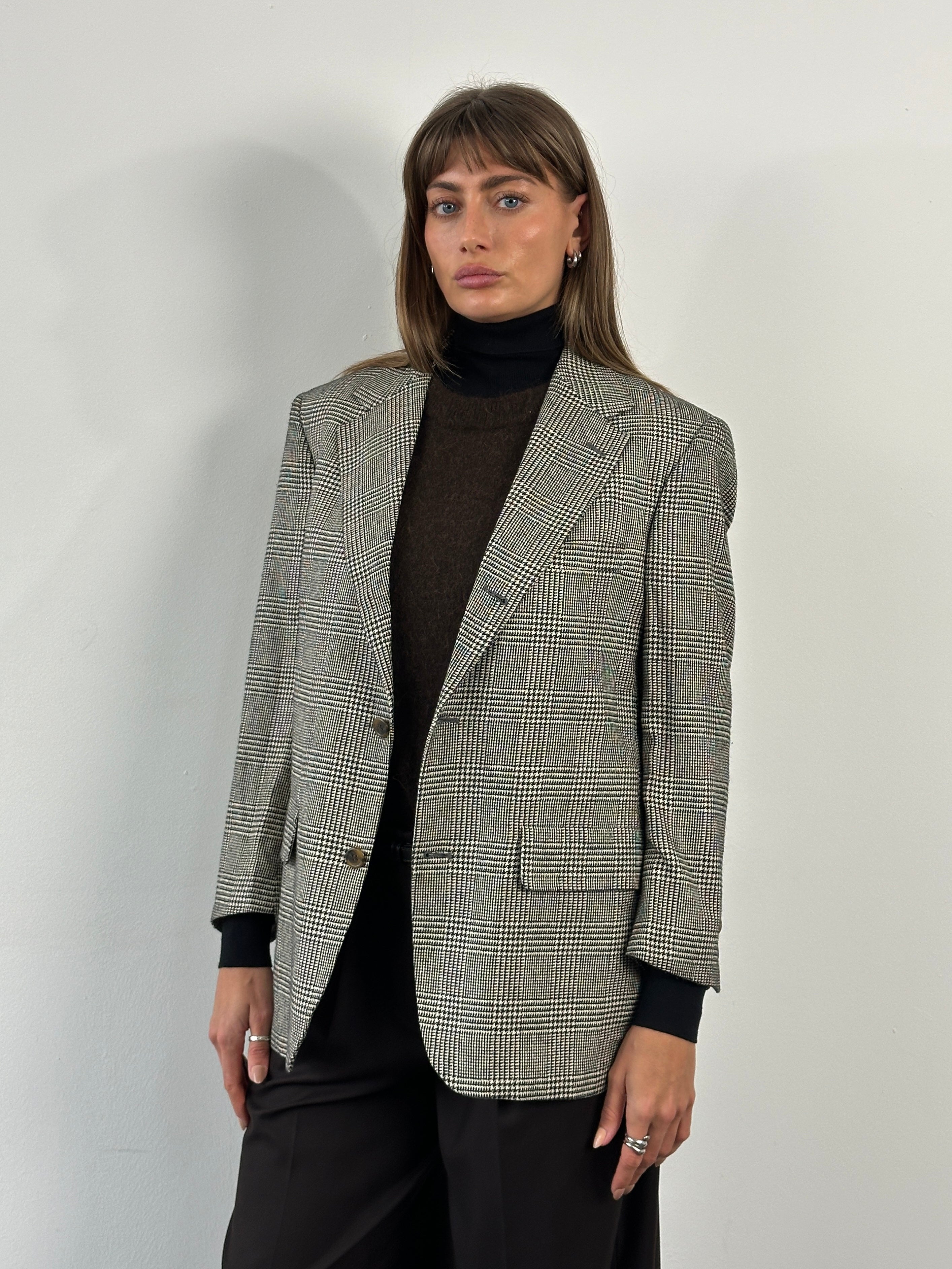 Brooks Brothers 1990s check wool single-breasted blazer in size 38S/M, featuring a classic tailored fit and vintage plaid pattern.
