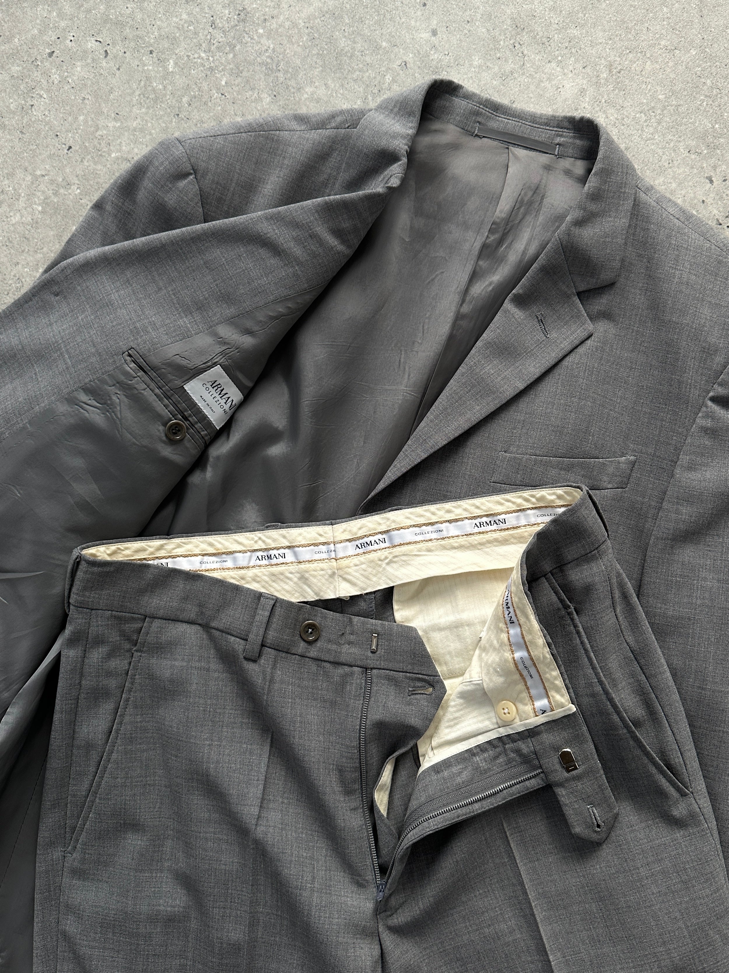 Armani Collezioni relaxed virgin wool single-breasted suit jumpsuit in size 40R/W32, shown in a tailored fit with lapel details.