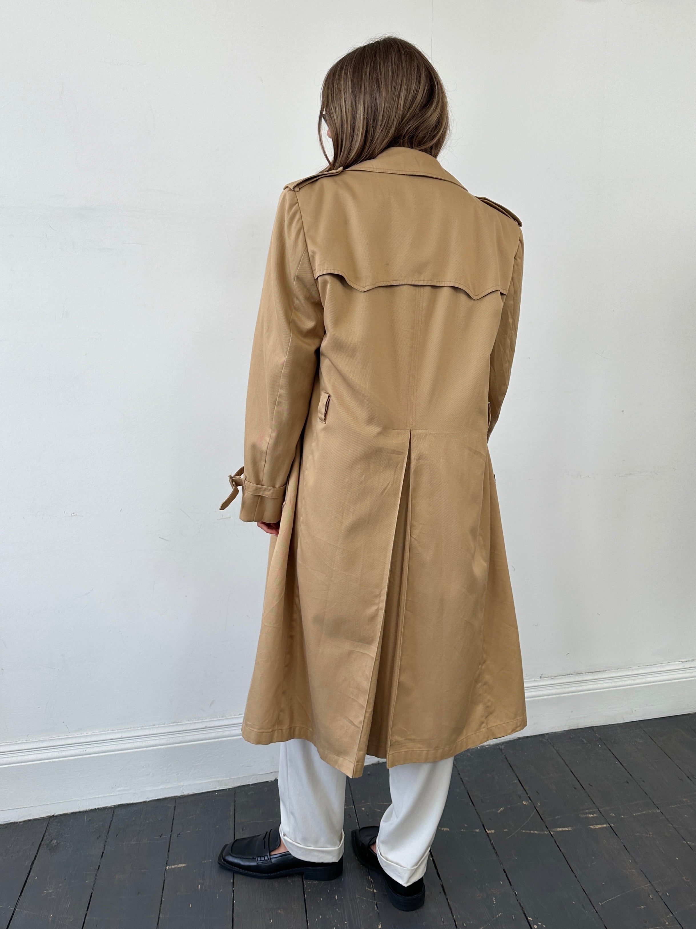 Christian Dior cotton double-breasted trench coat in size L/XL, beige color, with classic lapels and button details.