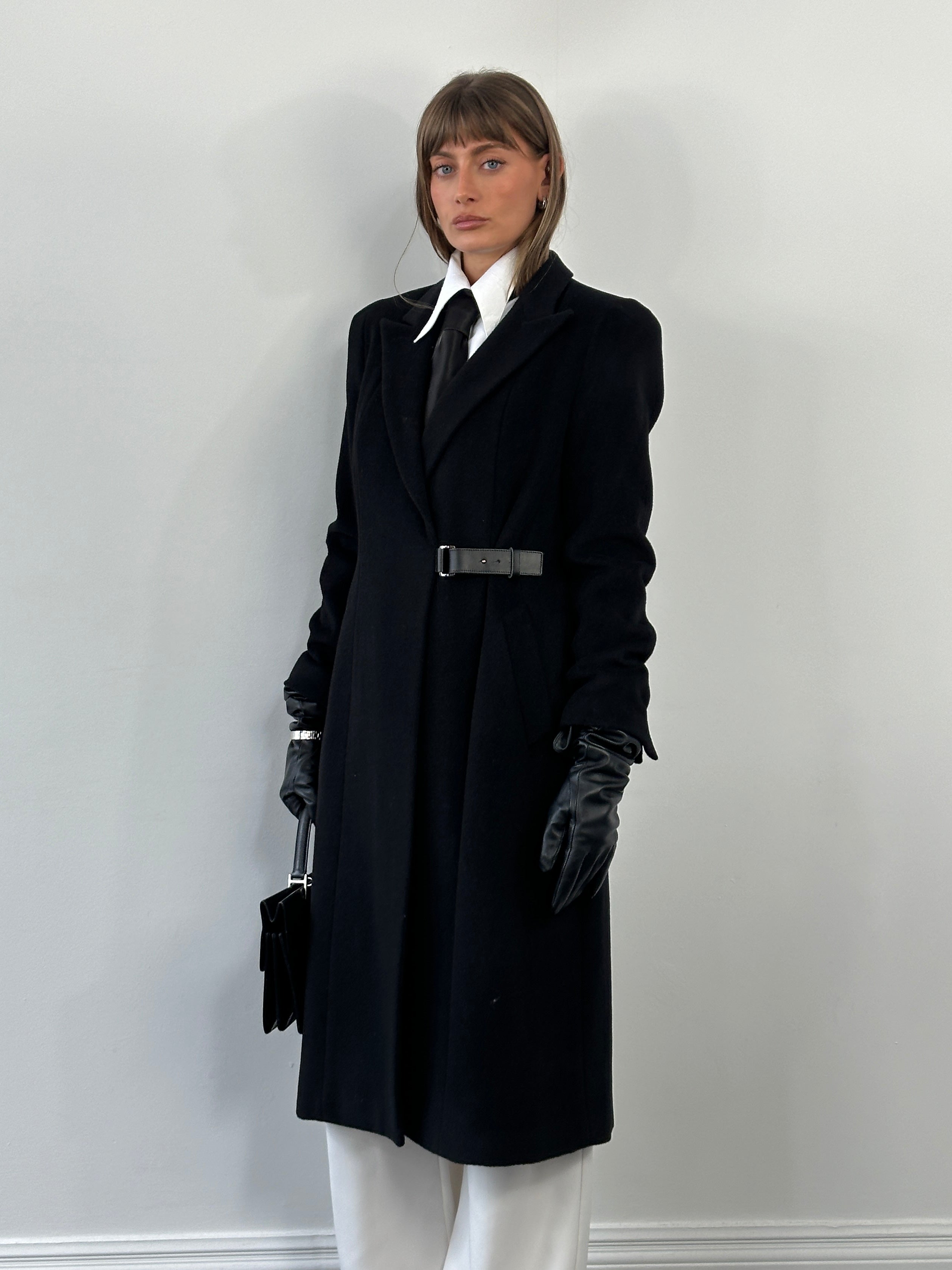 L.K. Bennett pure wool minimal wrap coat in size M, tailored fit with classic design and neutral color, displayed on a hanger.