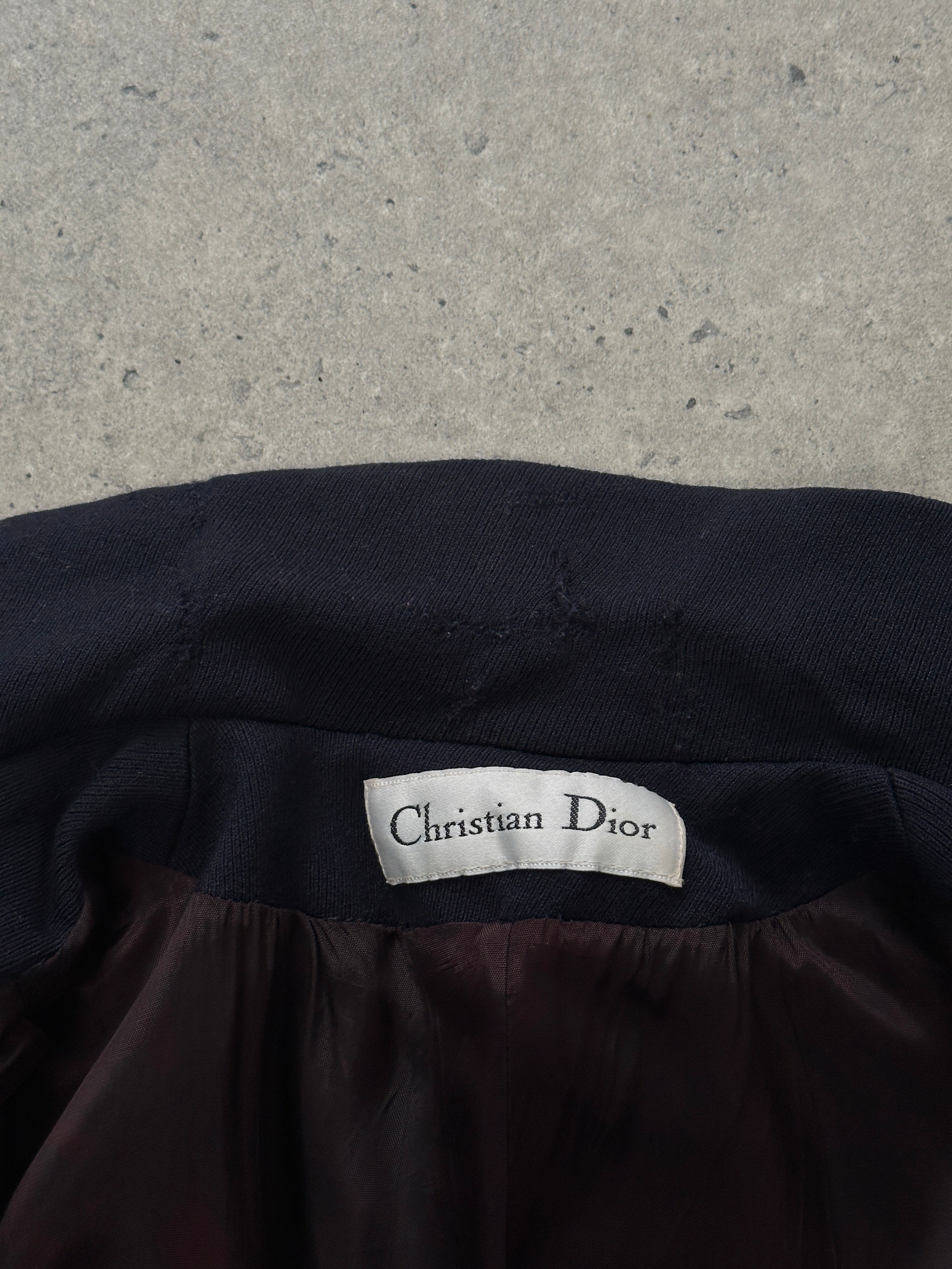 Christian Dior 1980s pure wool double-breasted coat, size small, classic vintage style, shown on a hanger.