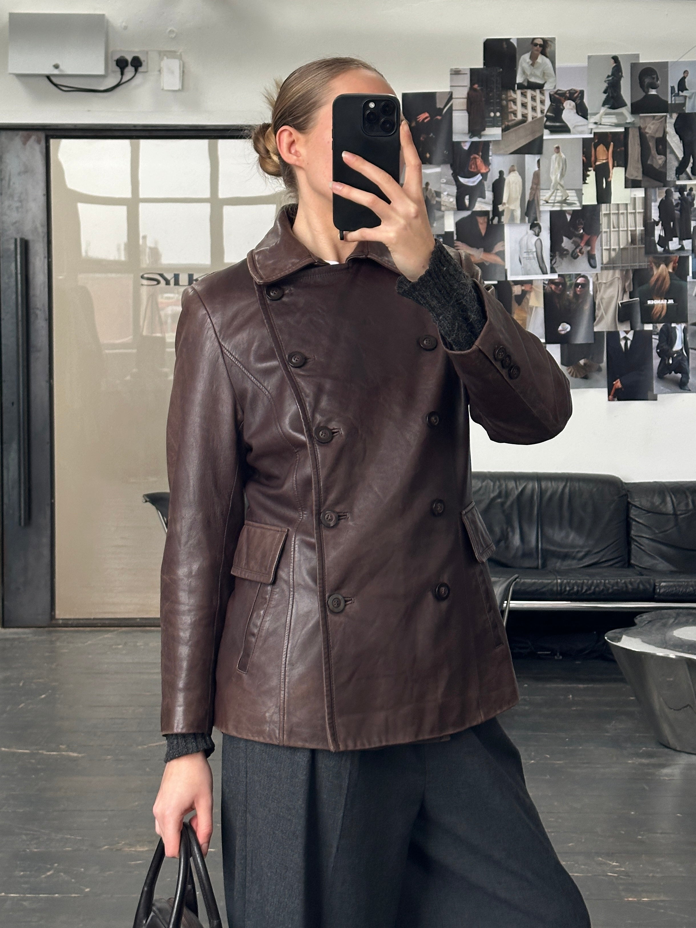 Vintage 1990s double-breasted lamb leather jacket in size M, featuring classic style and natural leather texture.