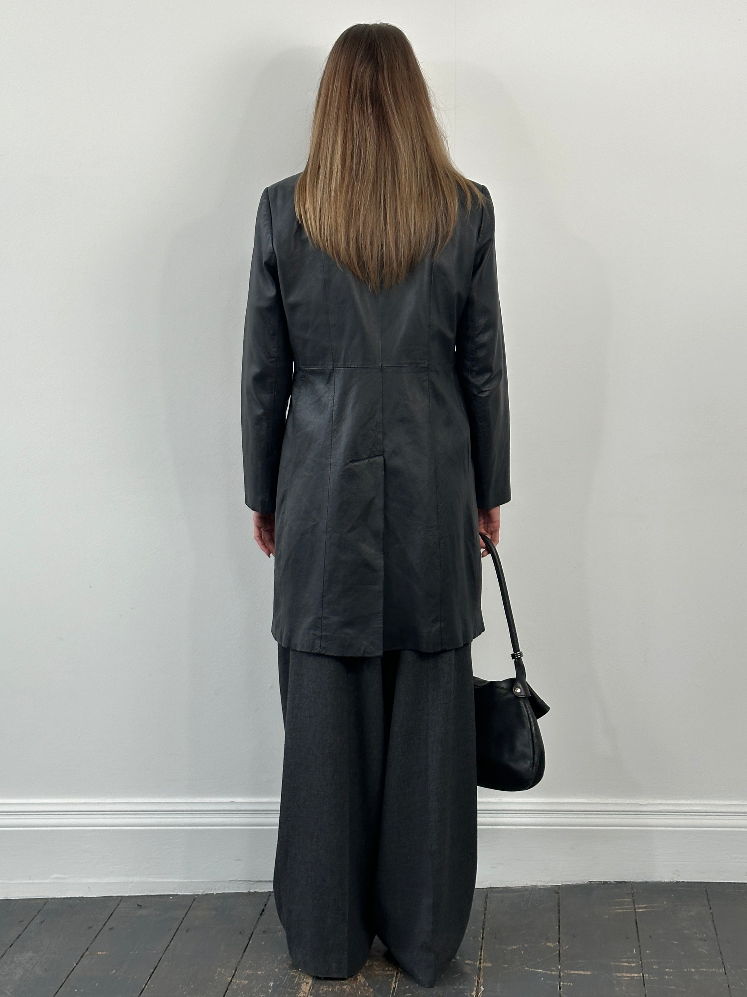 Vintage 1990s high neck leather trench coat, classic leather jacket with a high collar, in size M, showcasing retro style and craftsmanship.