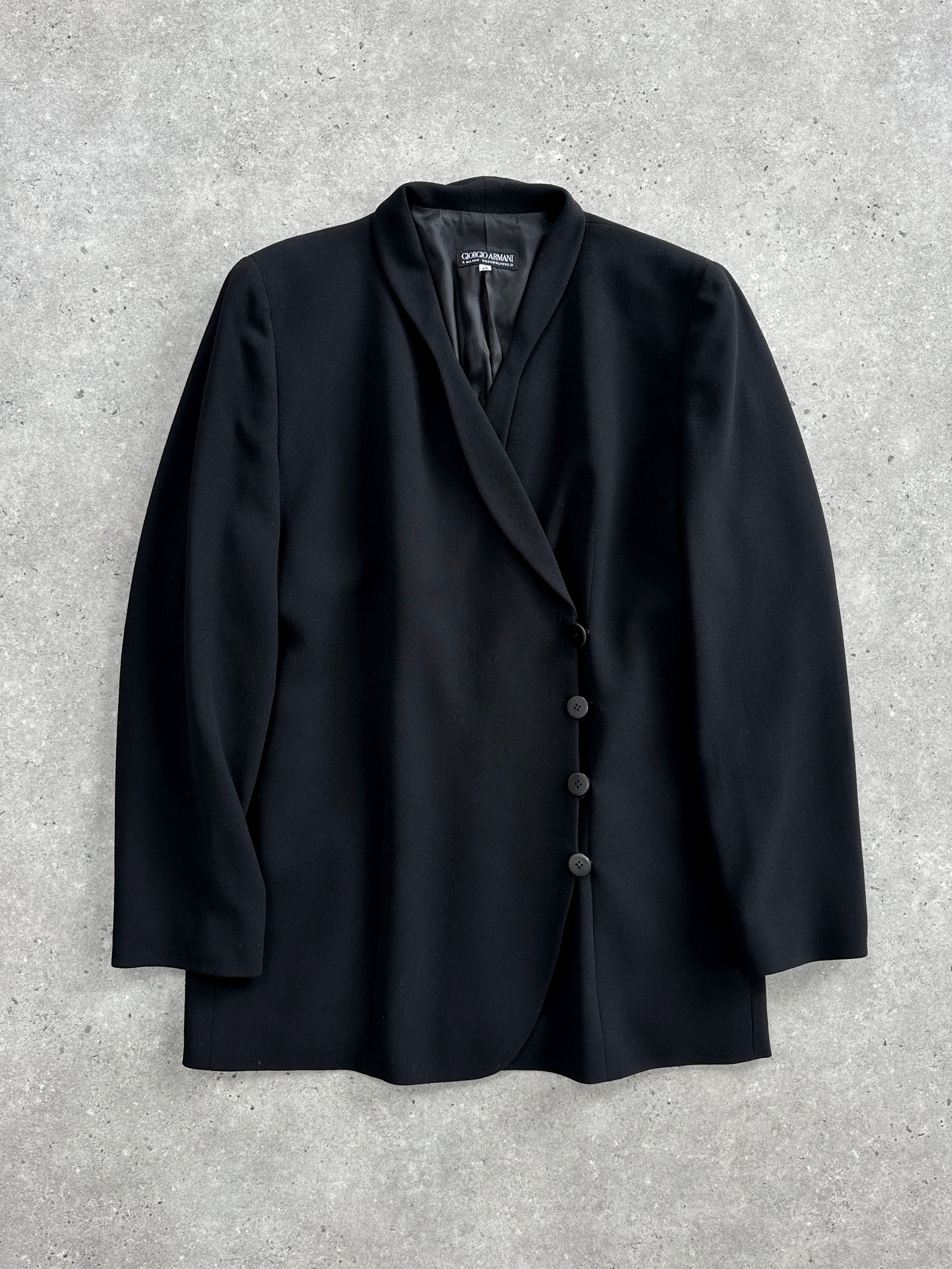 Giorgio Armani 80s wool blazer in size M/L, tailored fit with classic lapel, dark textured fabric, styled for vintage elegance