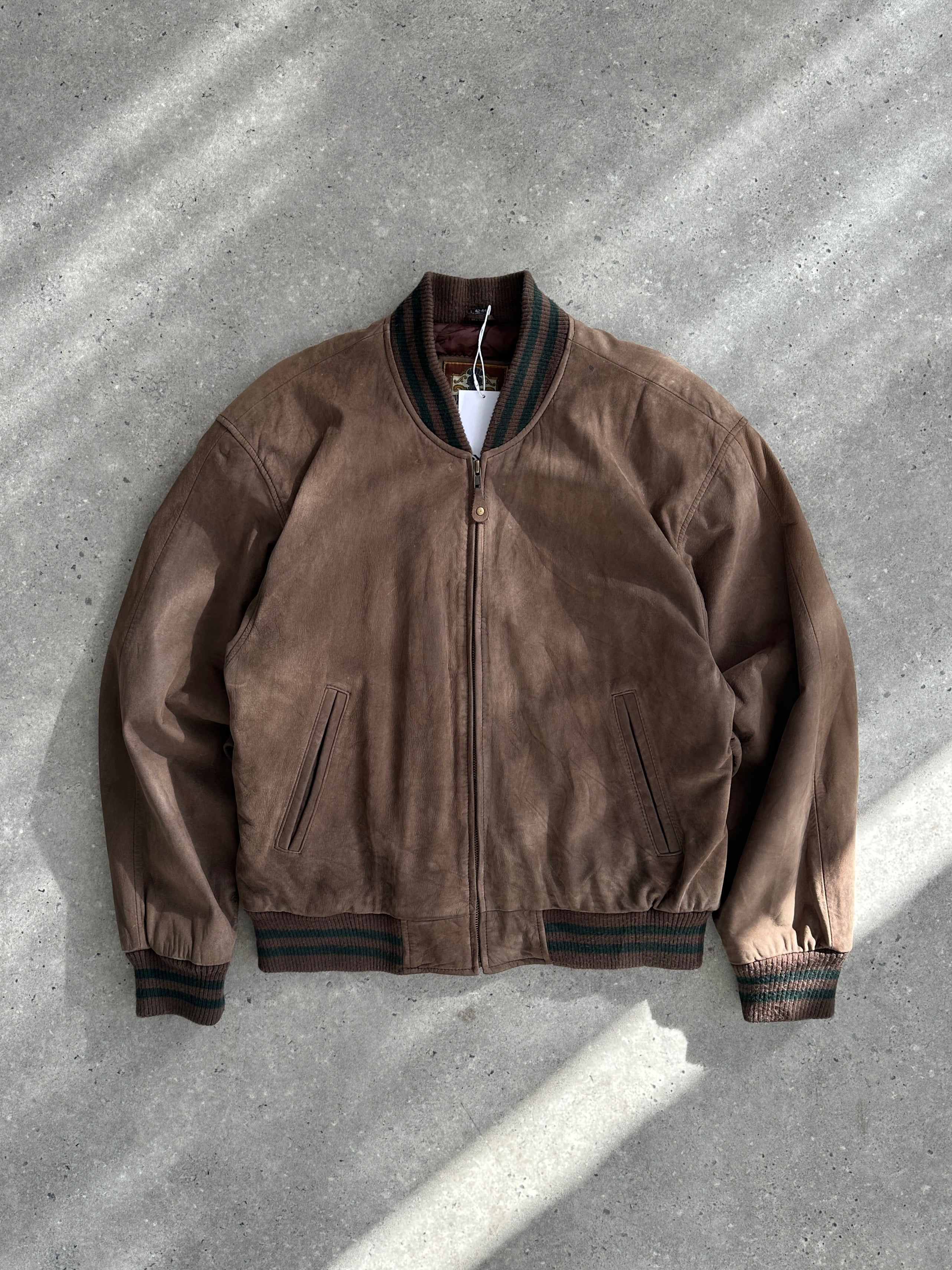 Vintage varsity nubuck leather bomber jacket in size M/L, featuring classic design and detailed stitching.