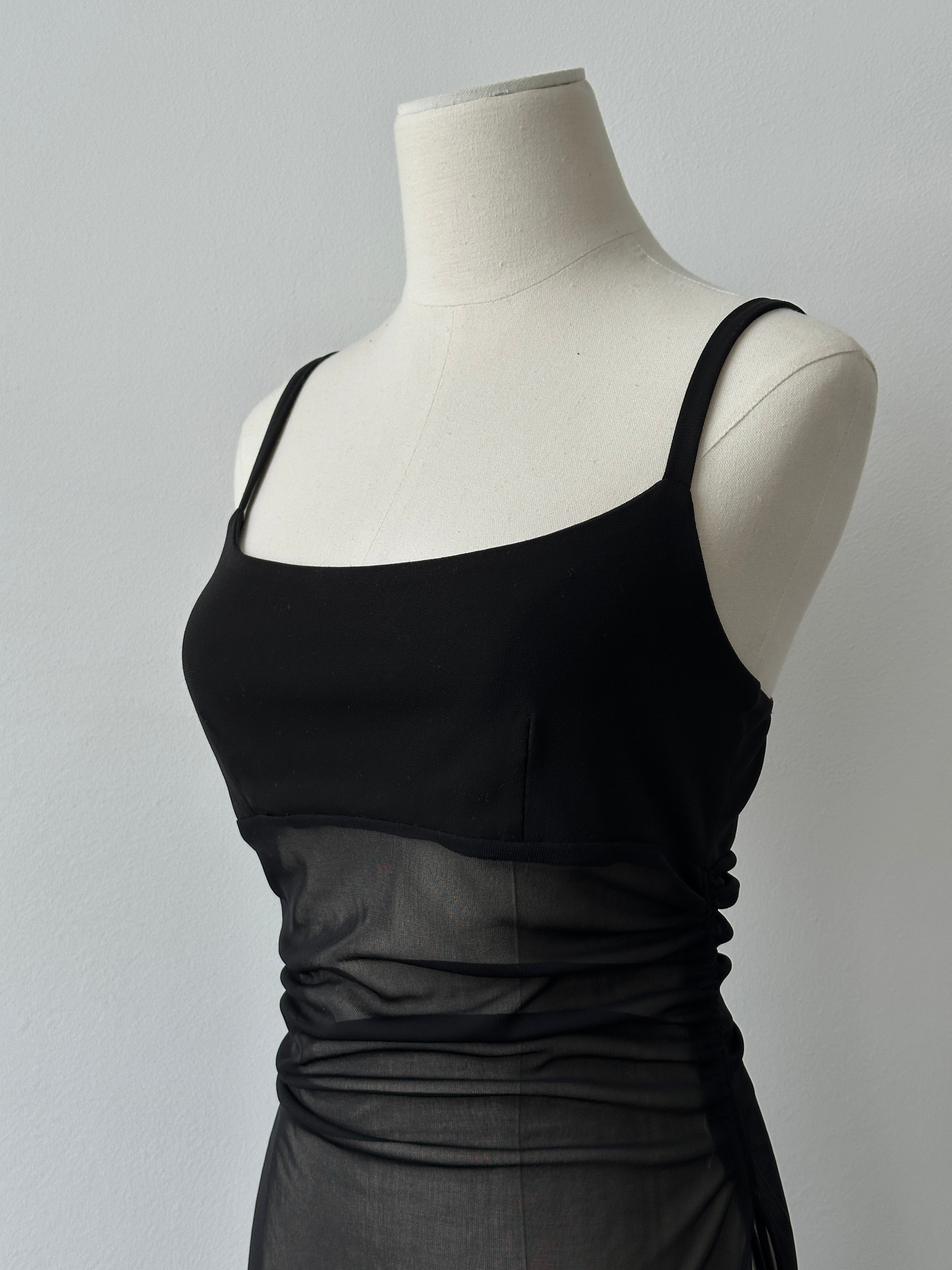 French vintage 1990s sheer sleeveless top, size small, featuring delicate fabric and classic design from the 1990s era.