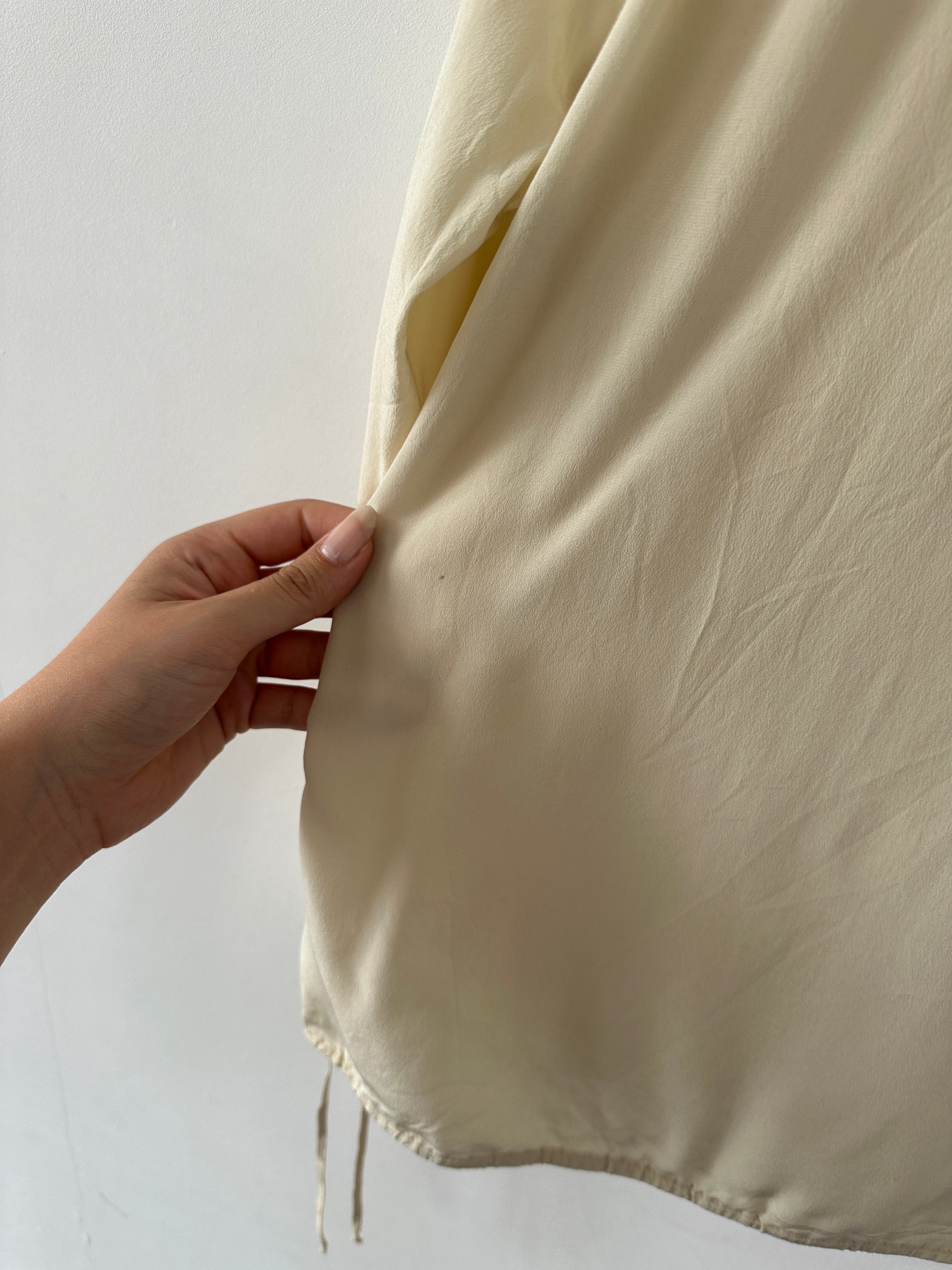 Max Mara pure silk ruffle tie front blouse in S/M with elegant design and soft fabric, displayed on a hanger.