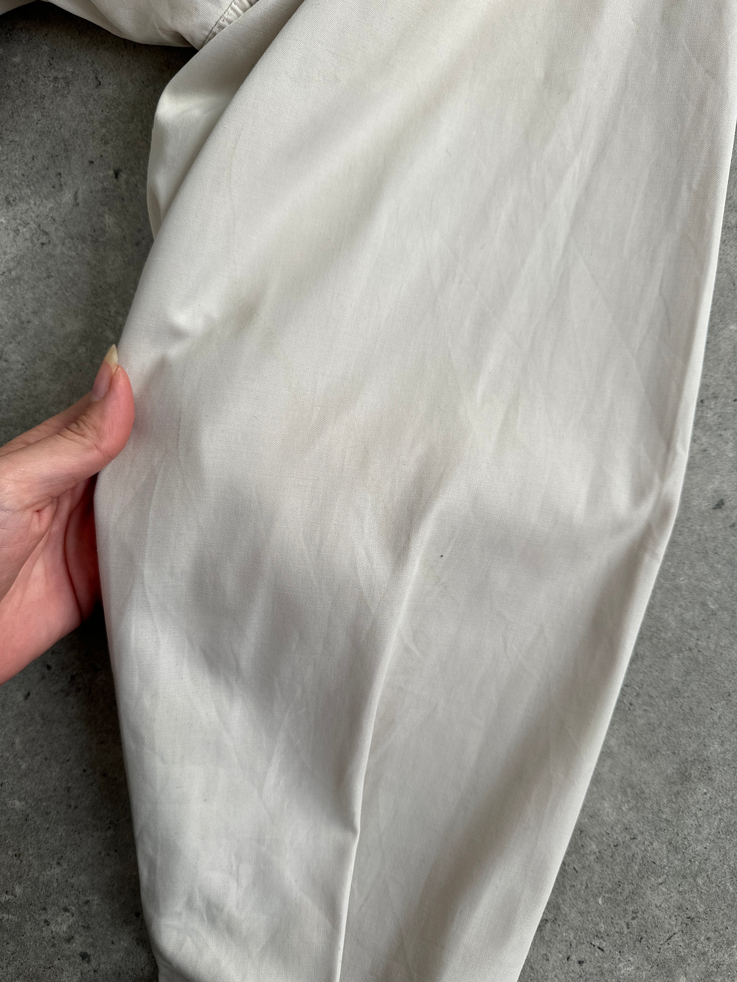 Burberry Nova Check logo bomber jacket in size L, featuring classic check pattern, ribbed cuffs, and front zip closure.