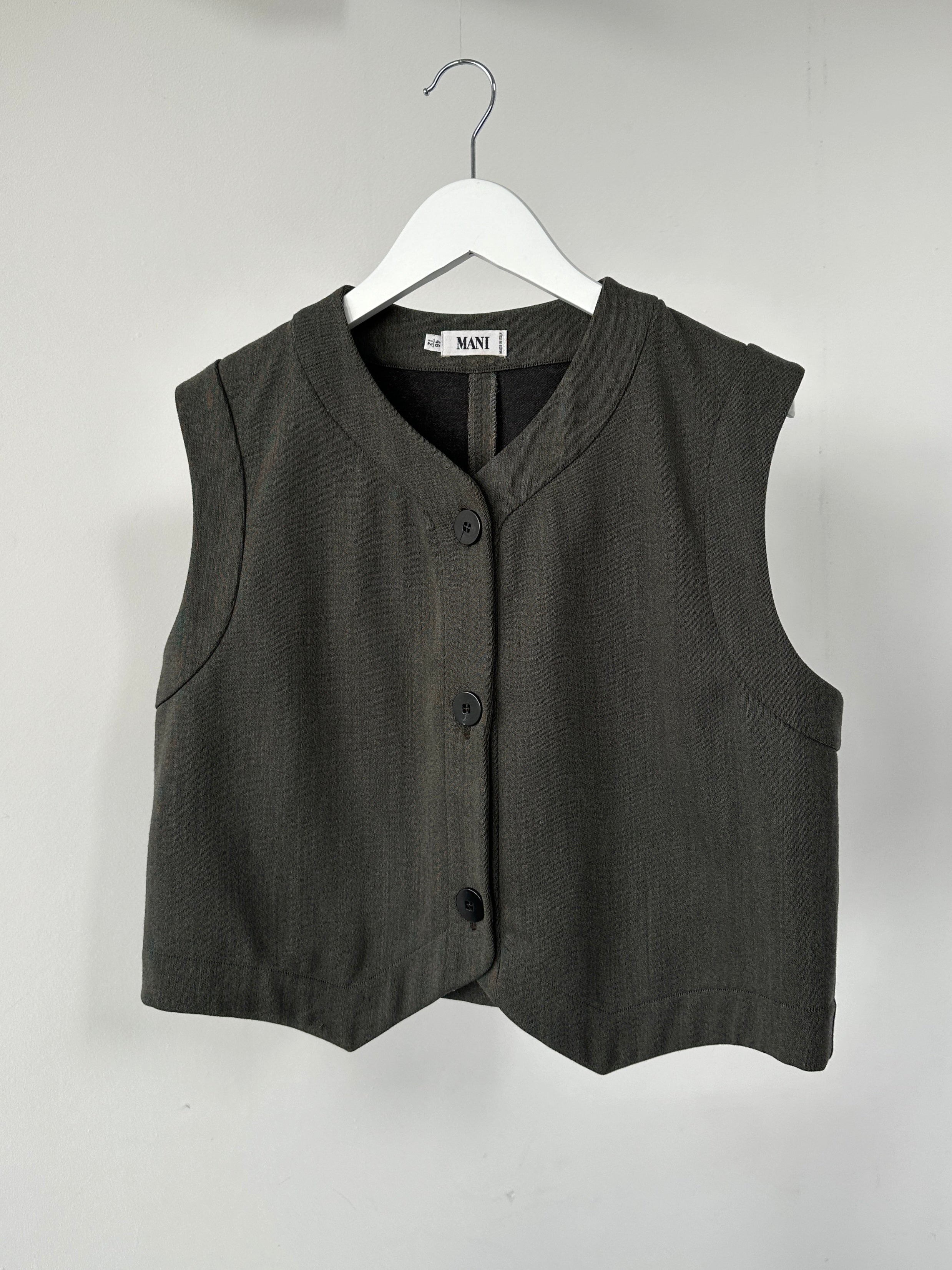 Mani Wool Waistcoat in size L, stylish sleeveless vest with wool fabric, front button closure, and classic design for versatile wear.