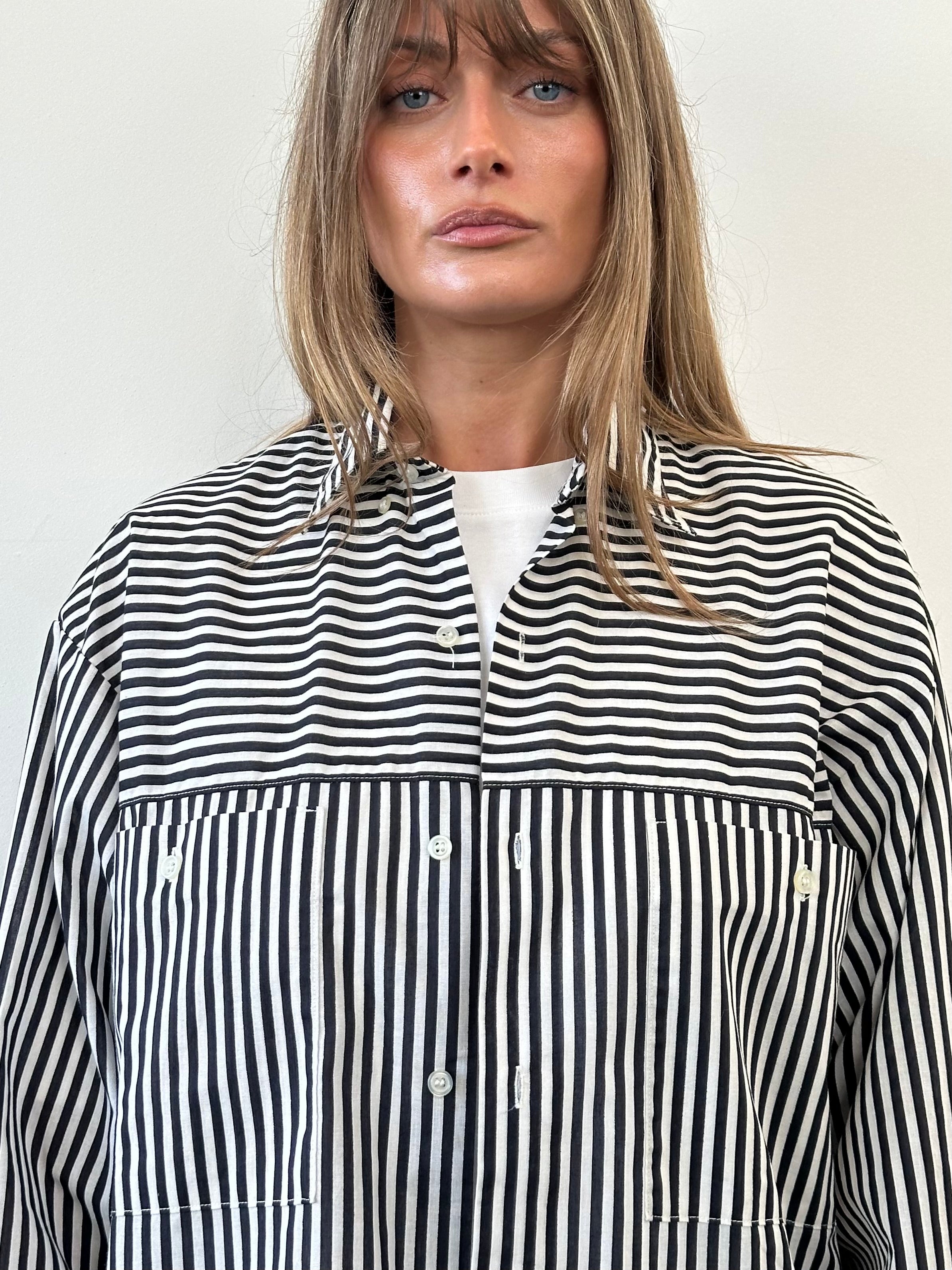 Vintage brand vintage stripe shirt in size XL, featuring bold horizontal stripes and classic collar detail.