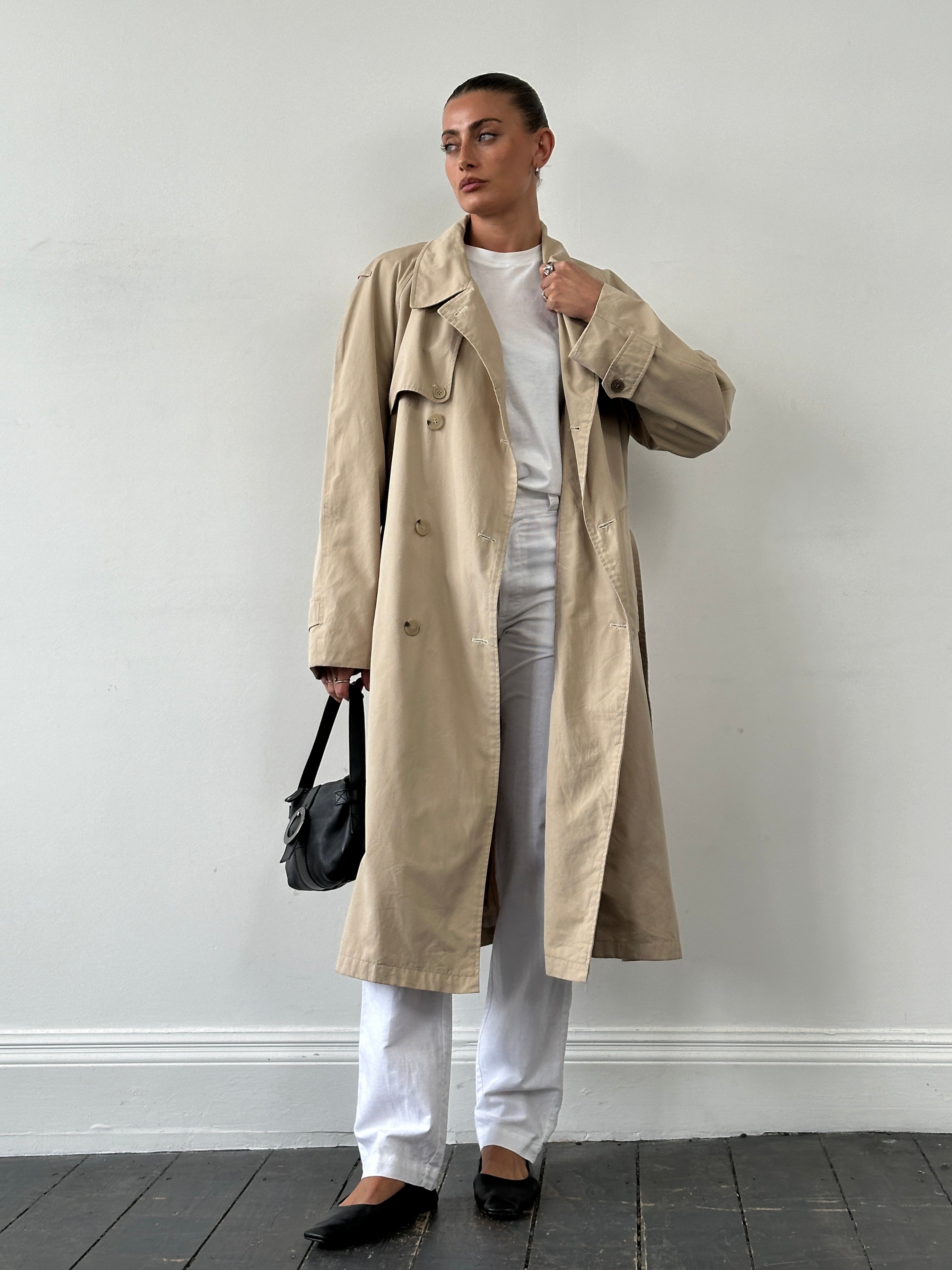 Yves Saint Laurent 70s cotton double-breasted belted trench coat in XL, beige color, featuring classic collar and button details.