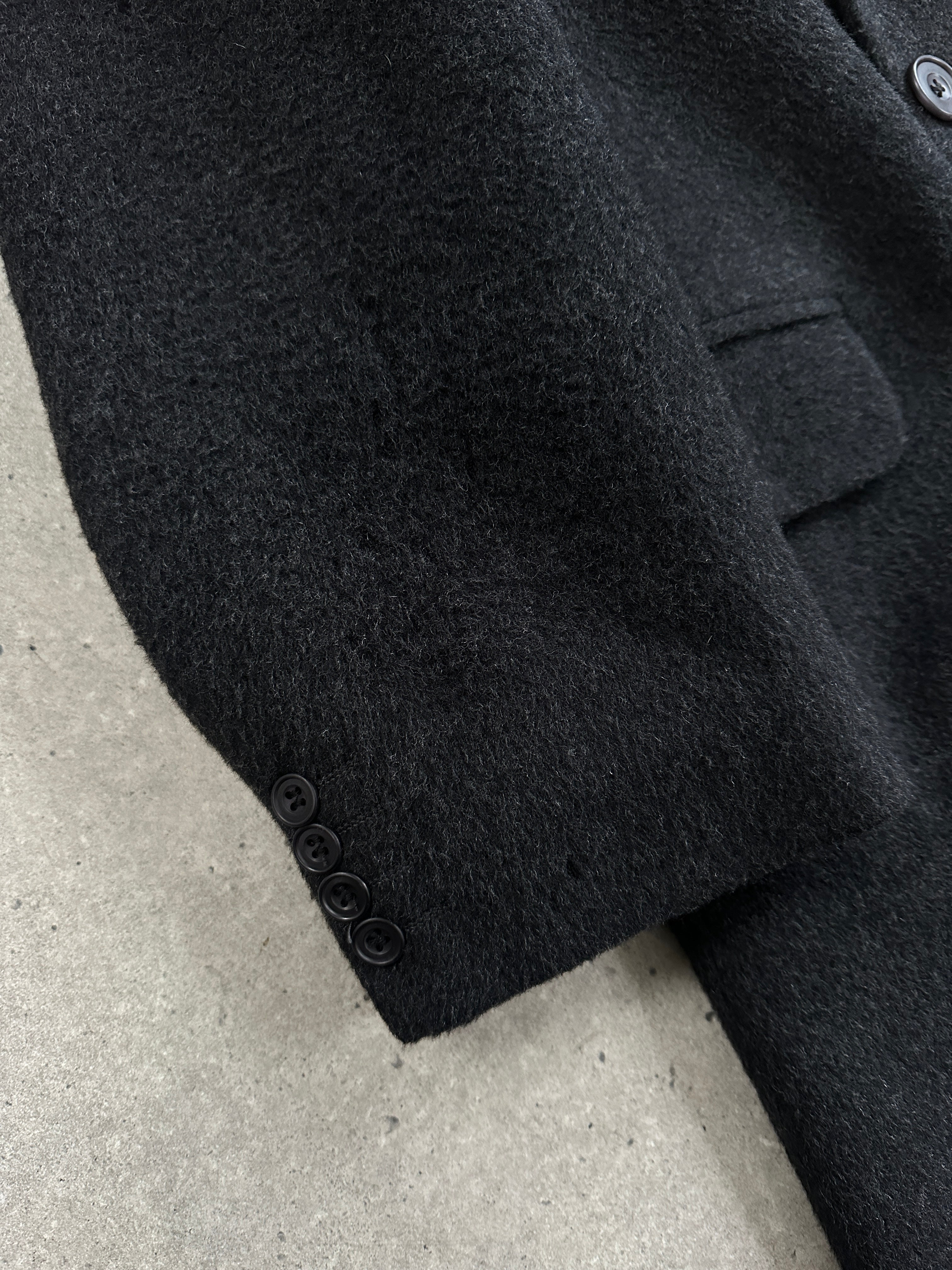 Vintage British 1990s wool cashmere double-breasted coat in XL, classic design with tailored lapels and button details.