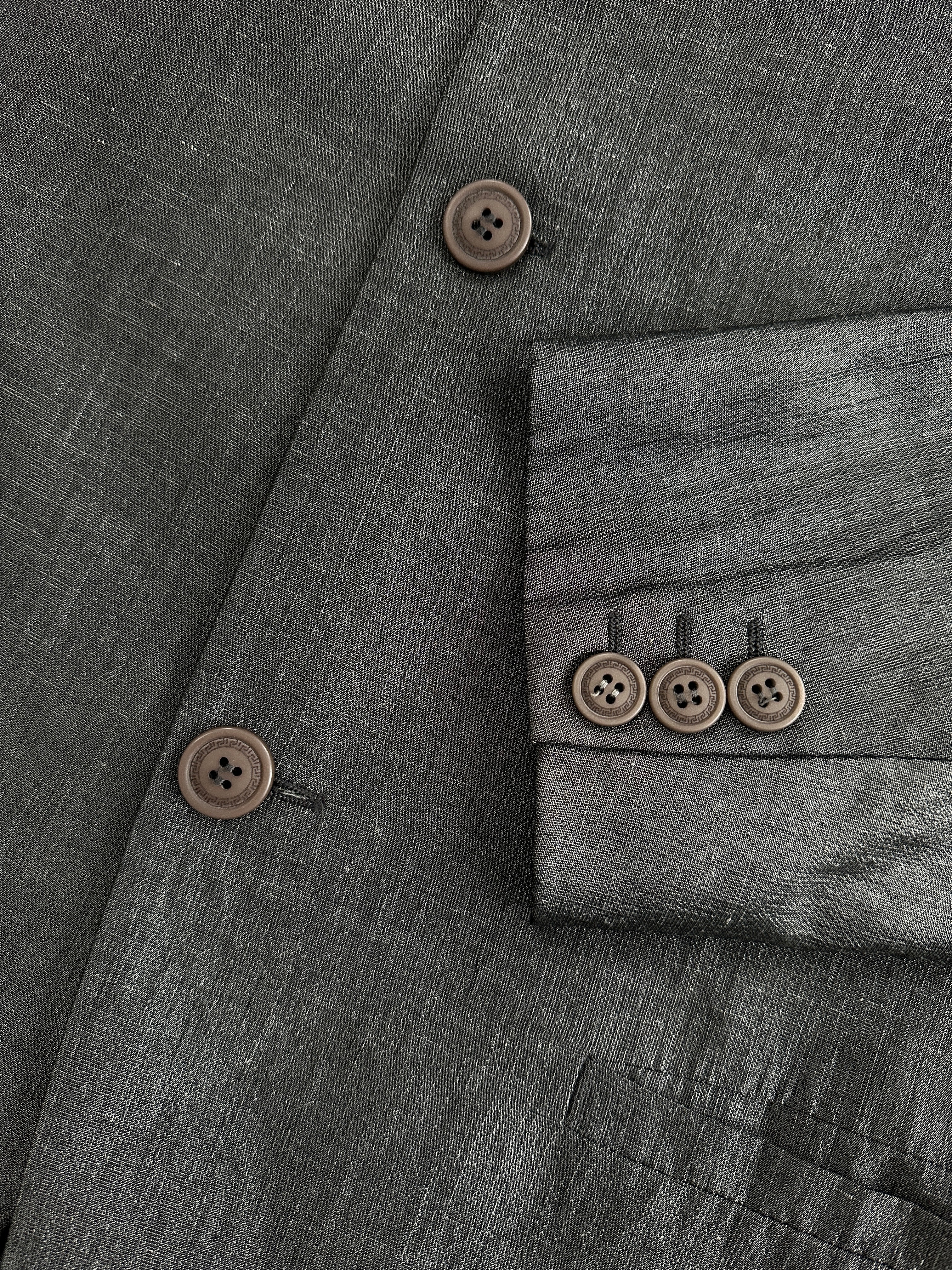 Versace Versus single-breasted blazer in size L, tailored fit with classic lapel, dark fabric, and stylish design.