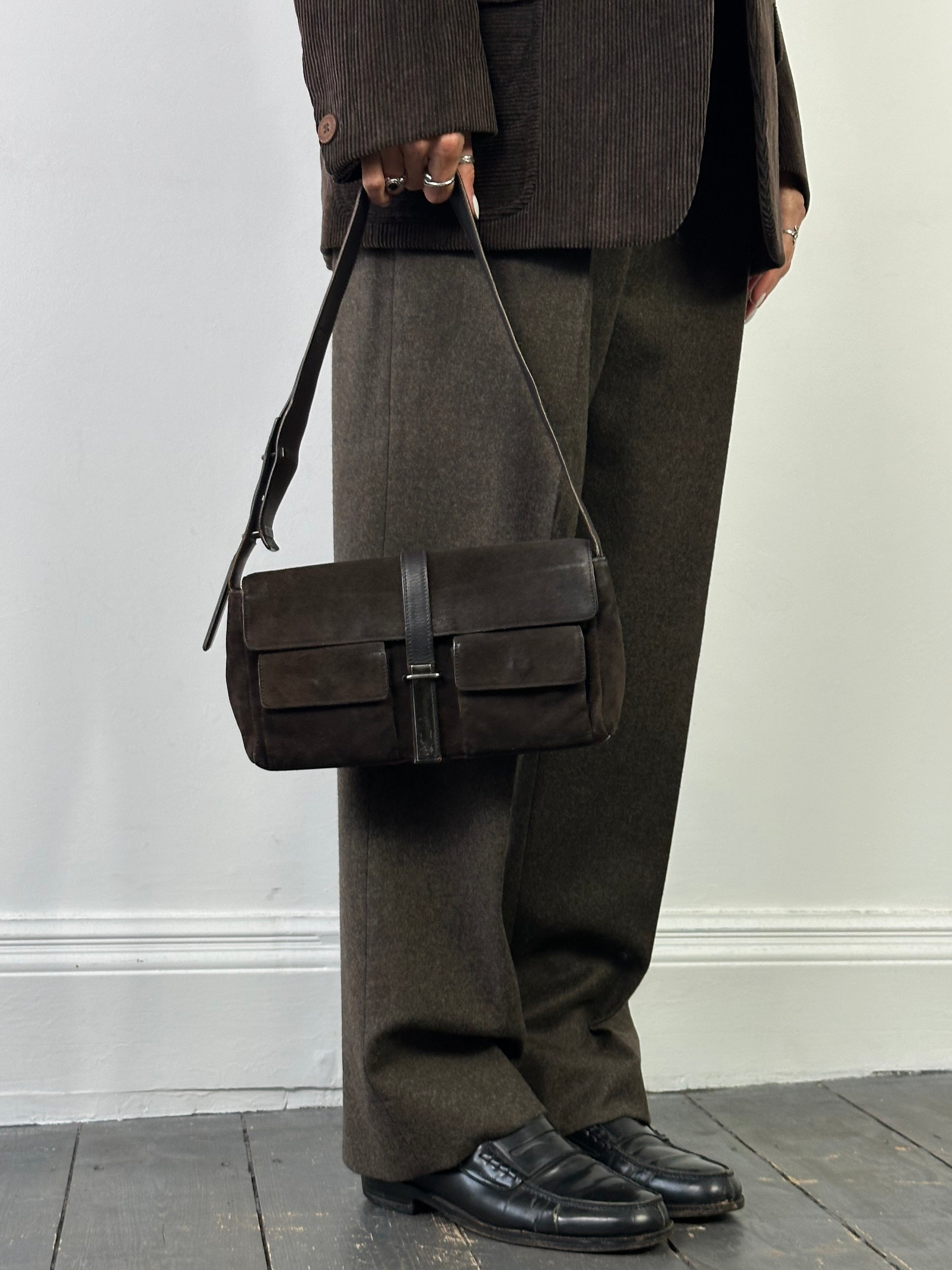 Yves Saint Laurent Rive Gauche suede shoulder bag with sleek design and shoulder strap, in a classic 2000s style.