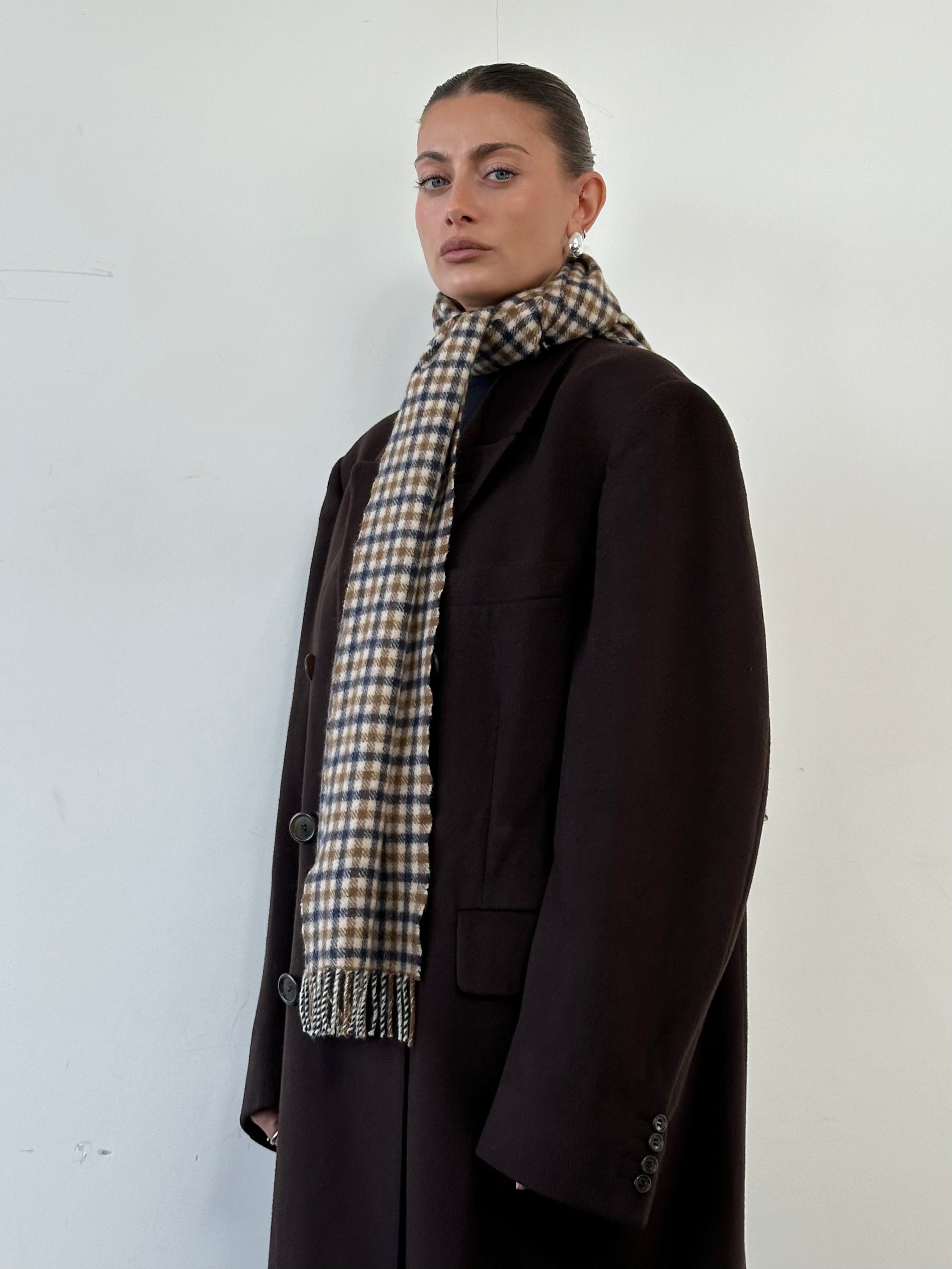 Aquascutum cashmere wool check scarf with classic pattern, soft texture, and stylish design perfect for cold weather.