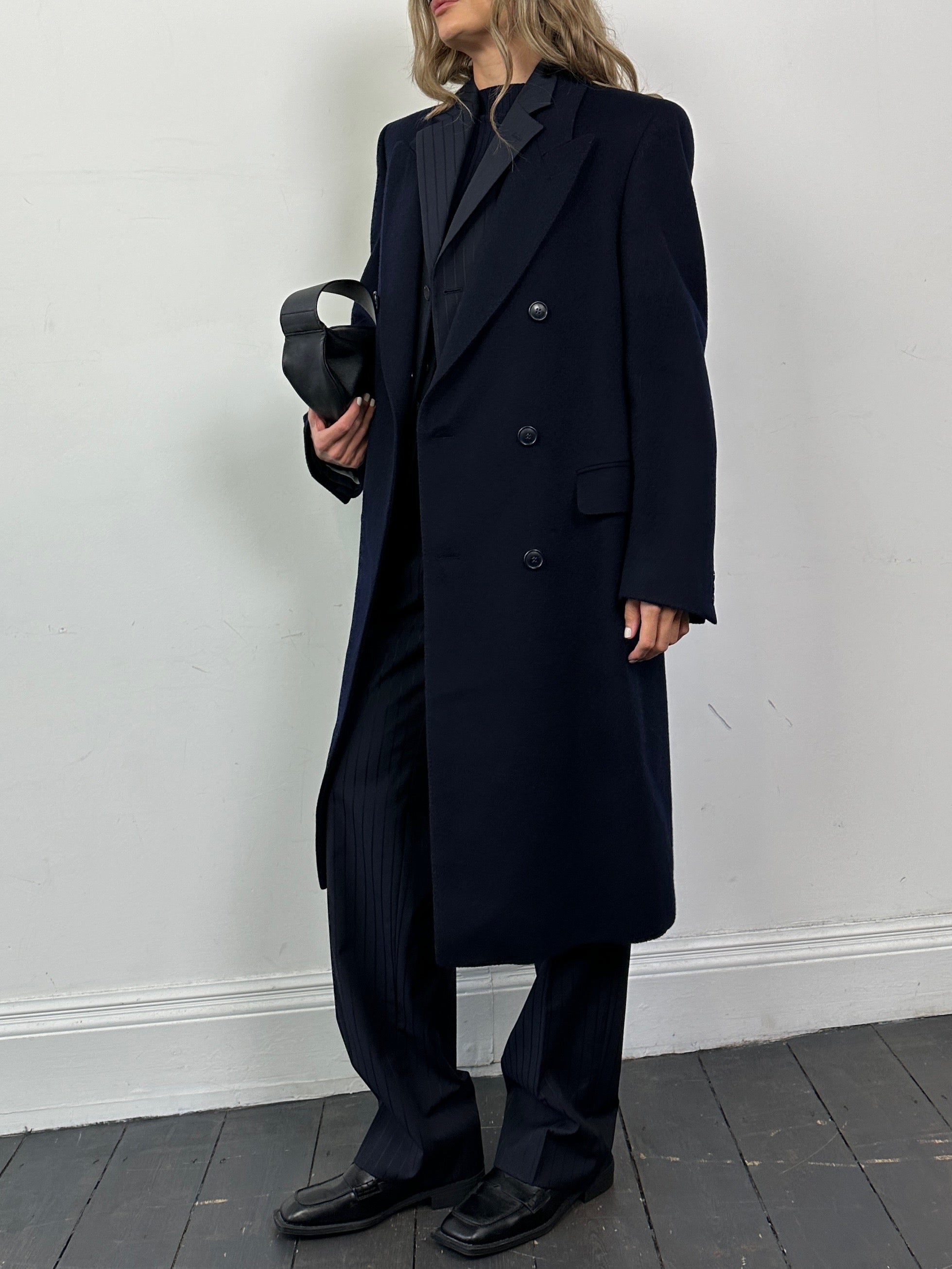 Vintage pure virgin wool double-breasted coat in M/L size, classic style with tailored lapels and button details.