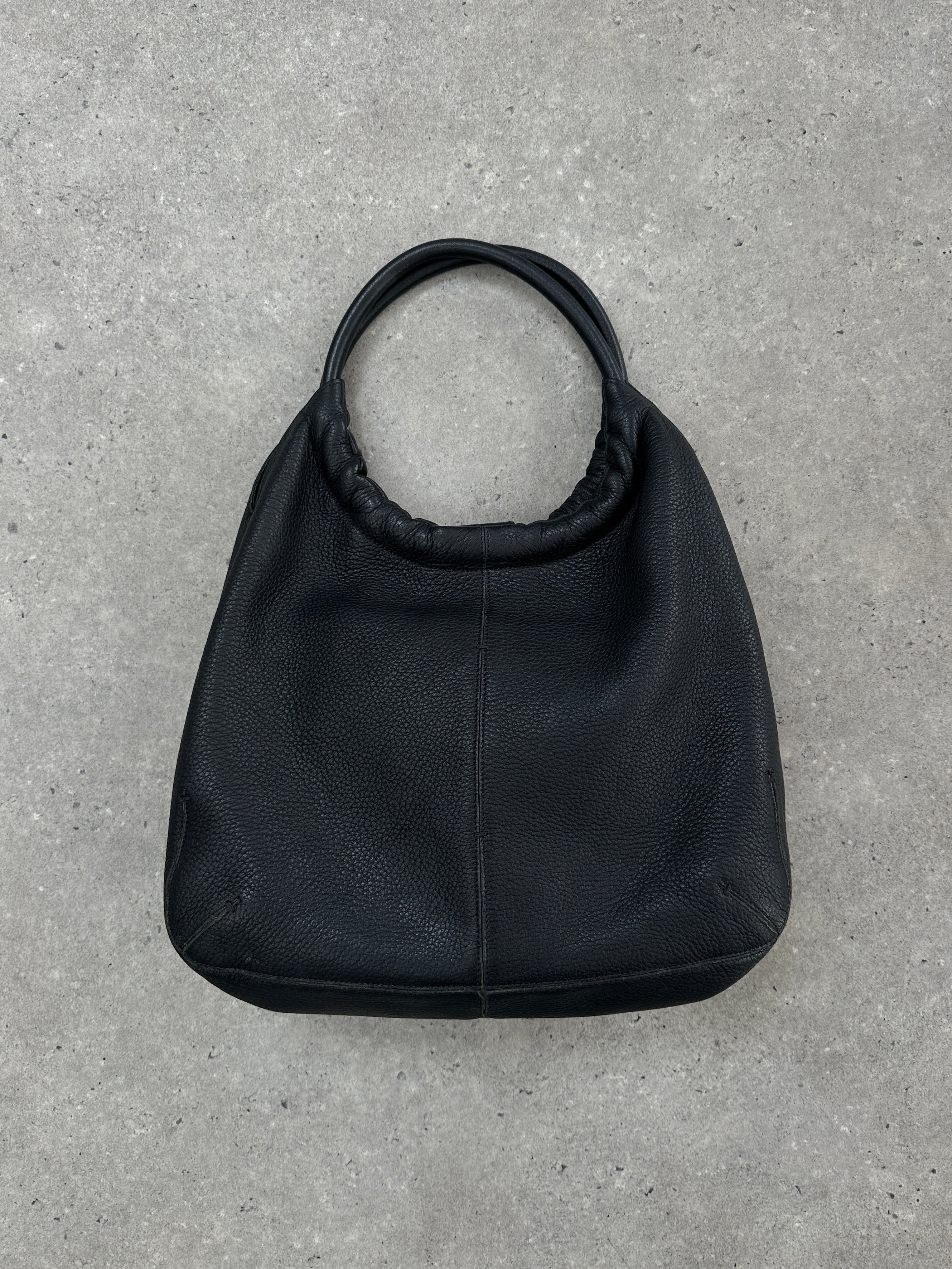 Giorgio Armani leather hobo shoulder bag from the 2000s with soft, slouchy design and top handle for casual elegance.
