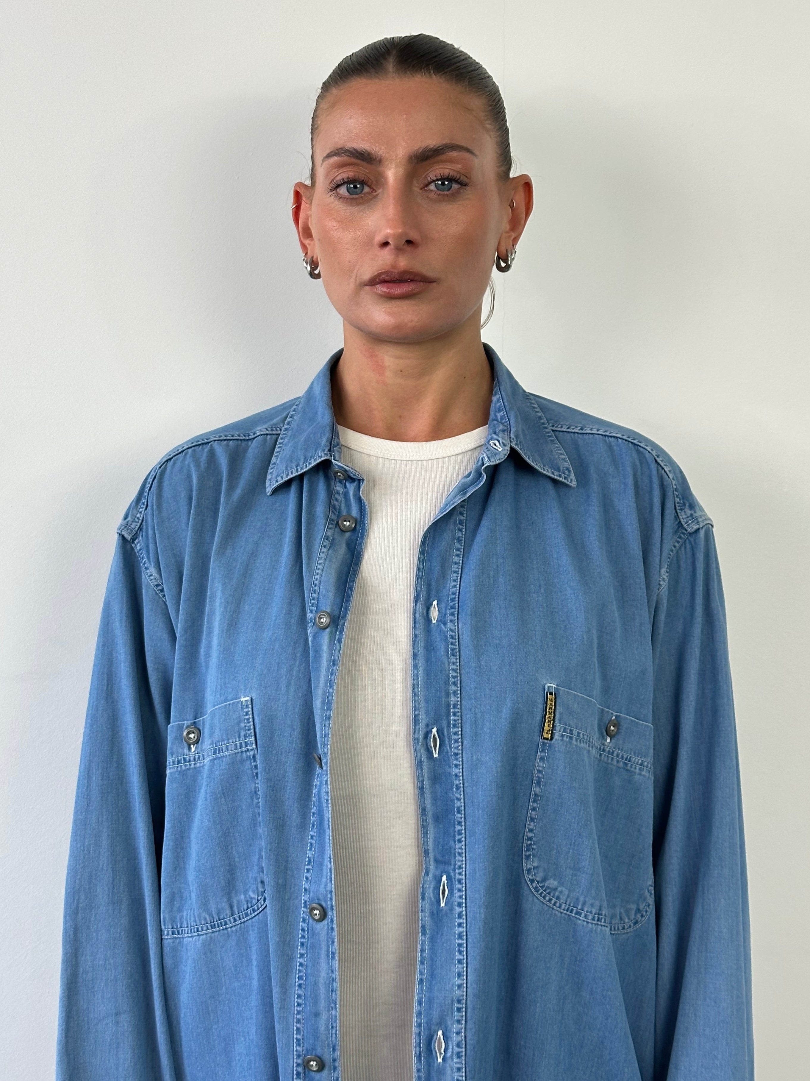 Armani Jeans denim logo shirt in XL, featuring a classic denim fabric with the Armani logo prominently displayed.