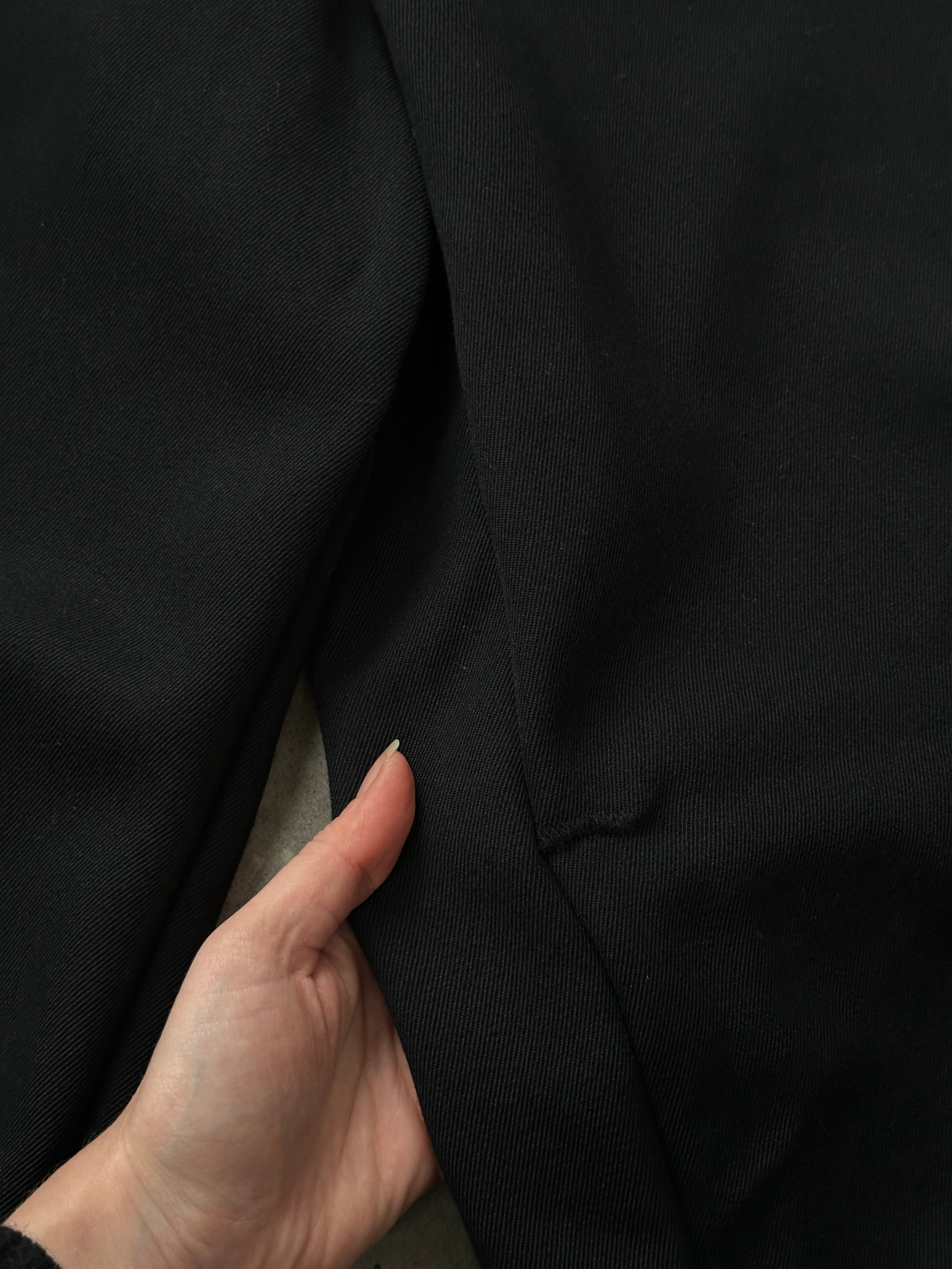 Vintage 1990s pure wool wide leg tailored trousers in size W26, showcasing classic vintage style and craftsmanship.