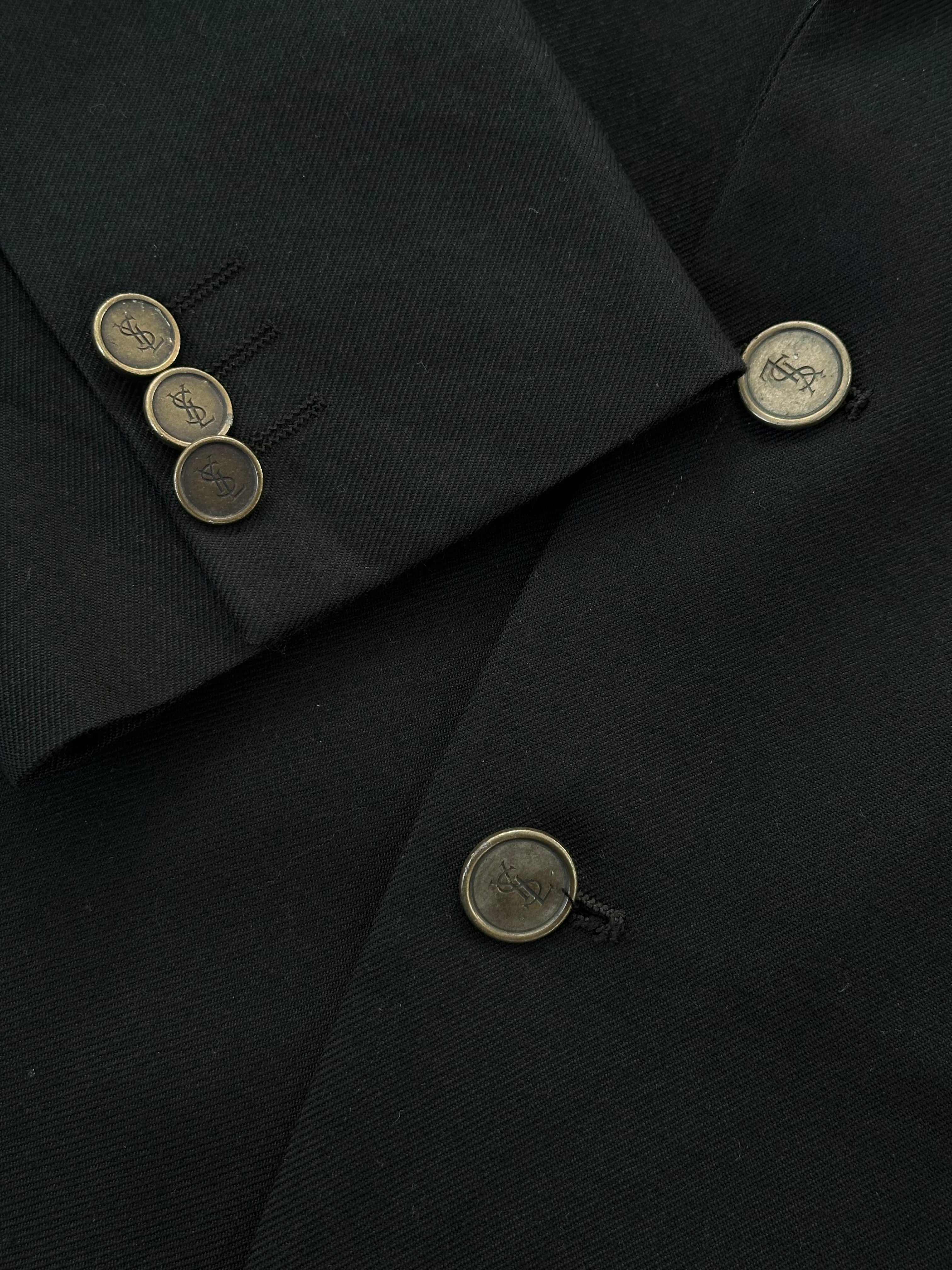Yves Saint Laurent men's 1990s pure wool bespoke button blazer in size 38R/M, tailored with classic lapels and a structured fit.