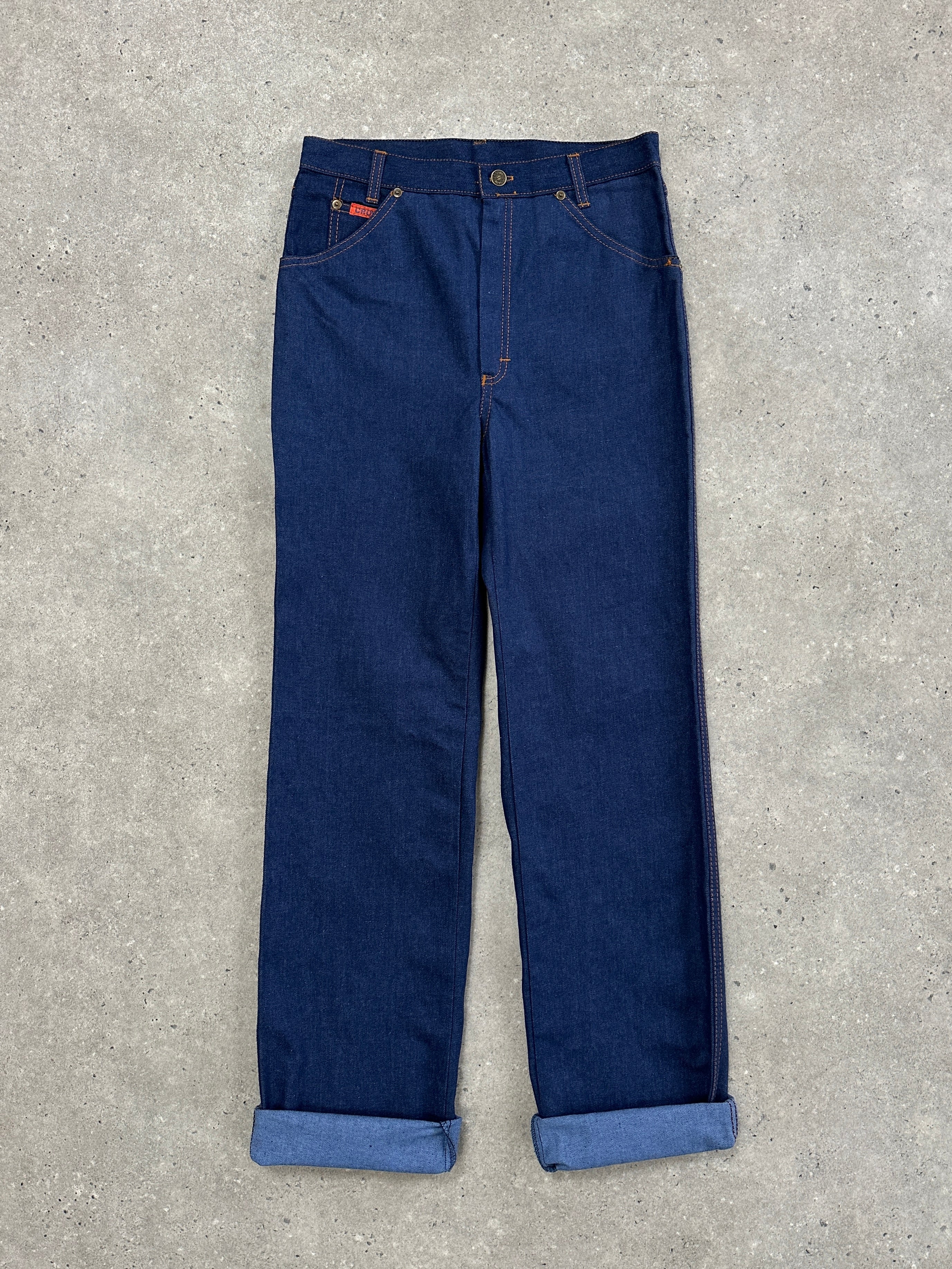 Vintage Italian 1990s high-waisted straight-leg denim jeans in size W28, showcasing classic blue denim and vintage wash.