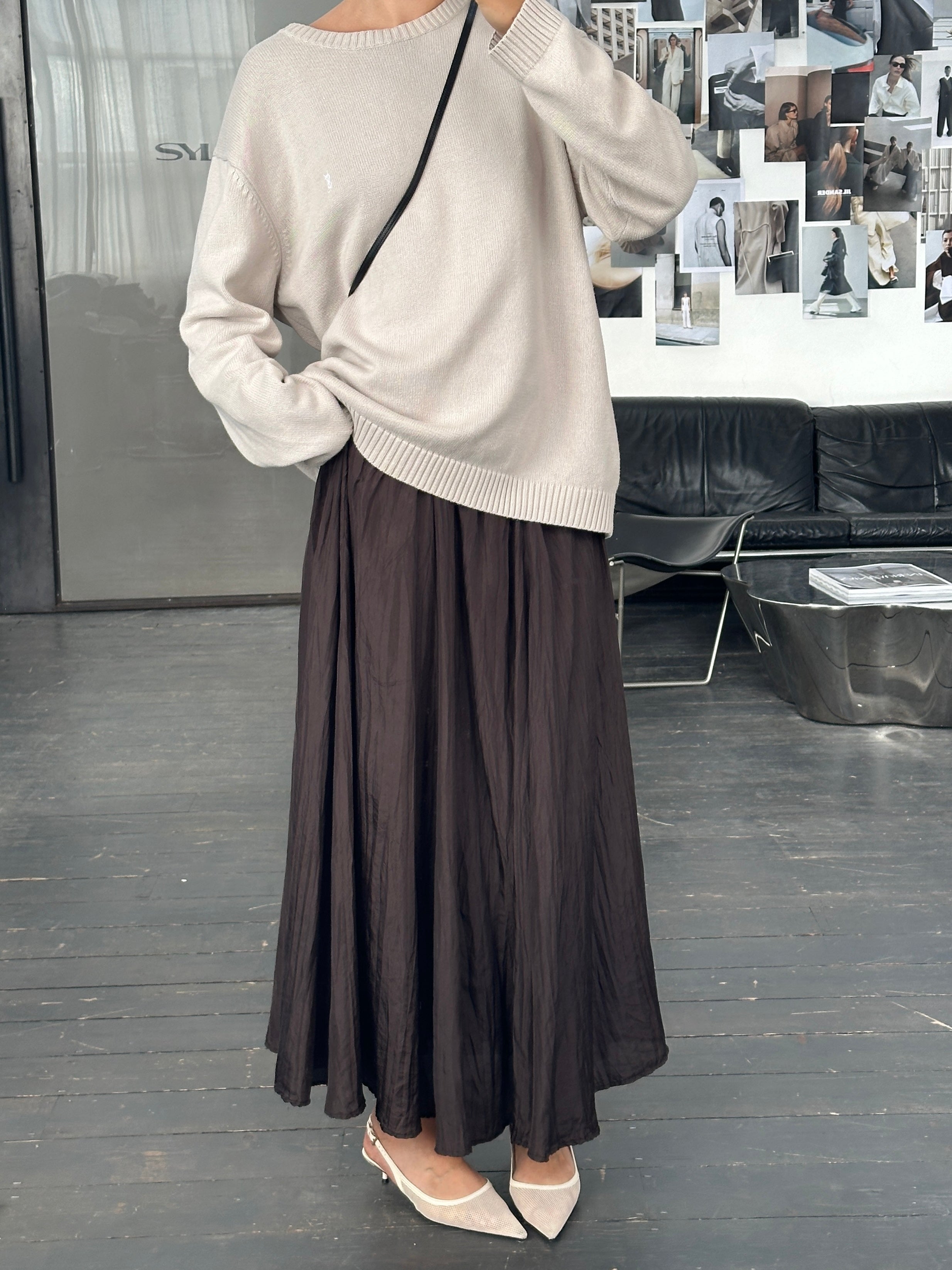 Vintage 1990s pure silk crinkle midi skirt in earthy tones, waist W32-36, showcasing flowing fabric and retro style.