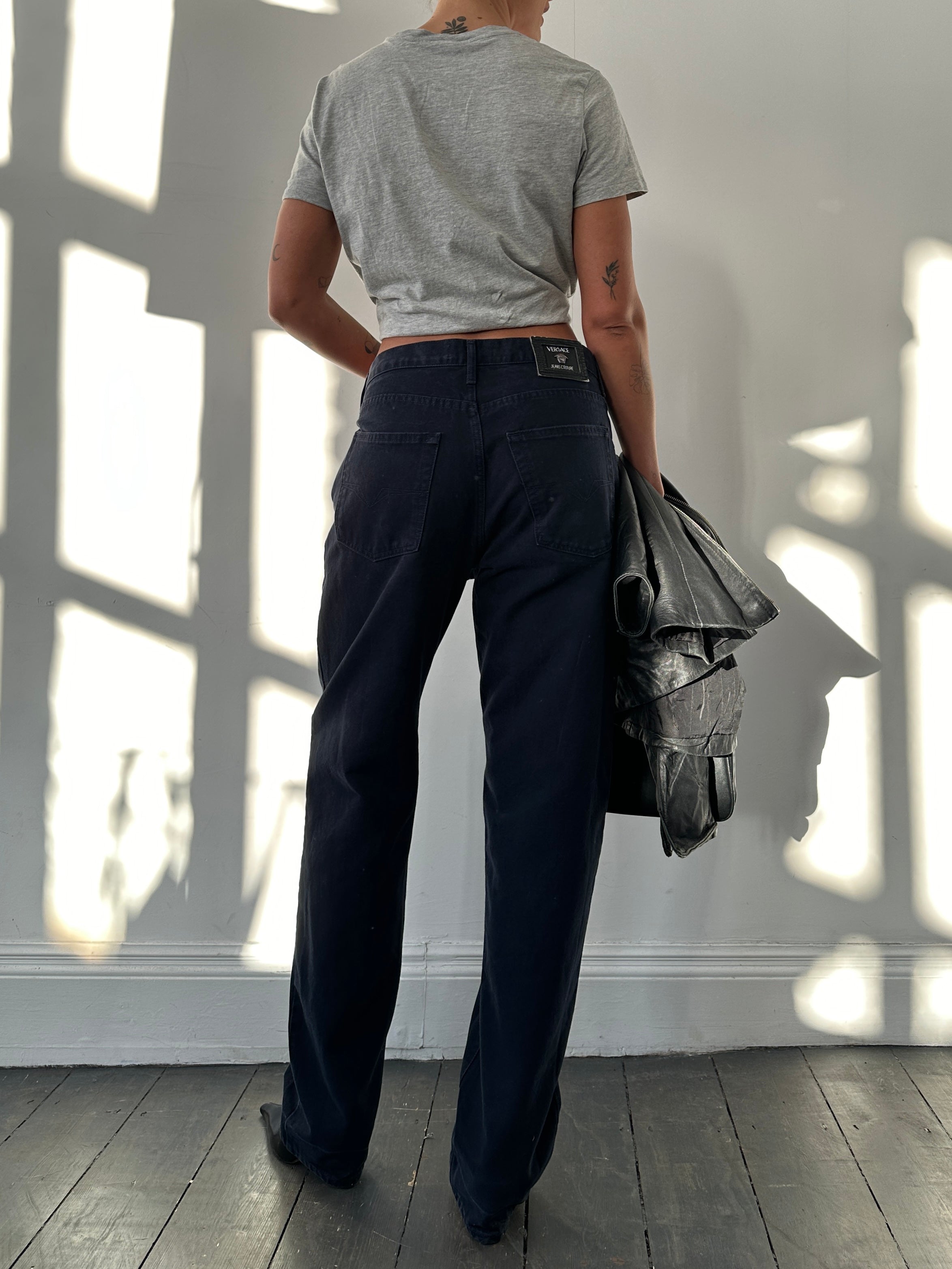 Versace tall pure cotton tapered leg denim jeans in W34, featuring classic blue wash and modern slim fit design.