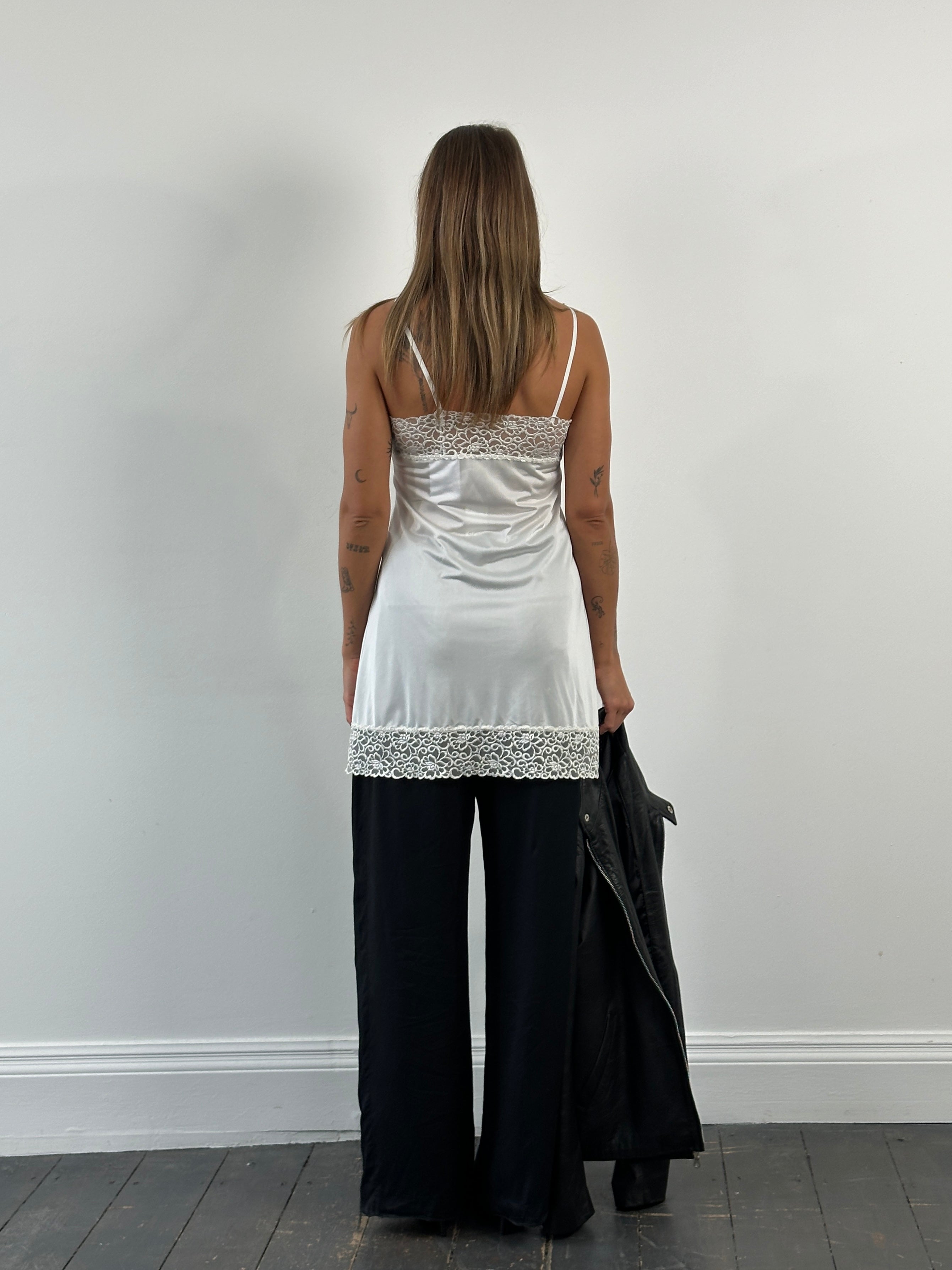 Vintage Japanese 1990s lace sheer mini slip dress, size S, featuring delicate lace fabric and a vintage style.