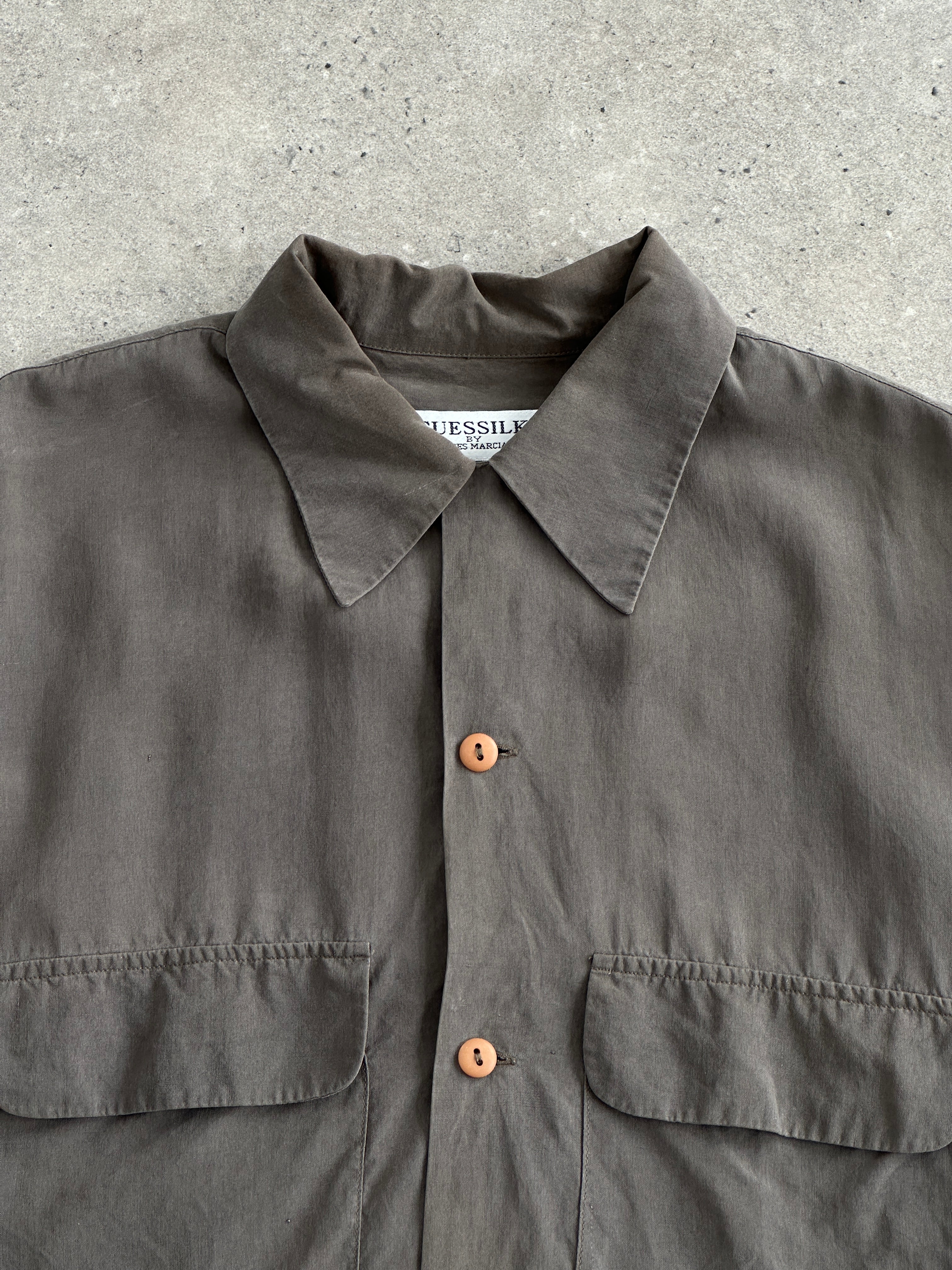 Vintage GUESSILK 1990s pure silk minimal shirt in size L, shown in a classic, sleek design with smooth fabric and tailored fit.