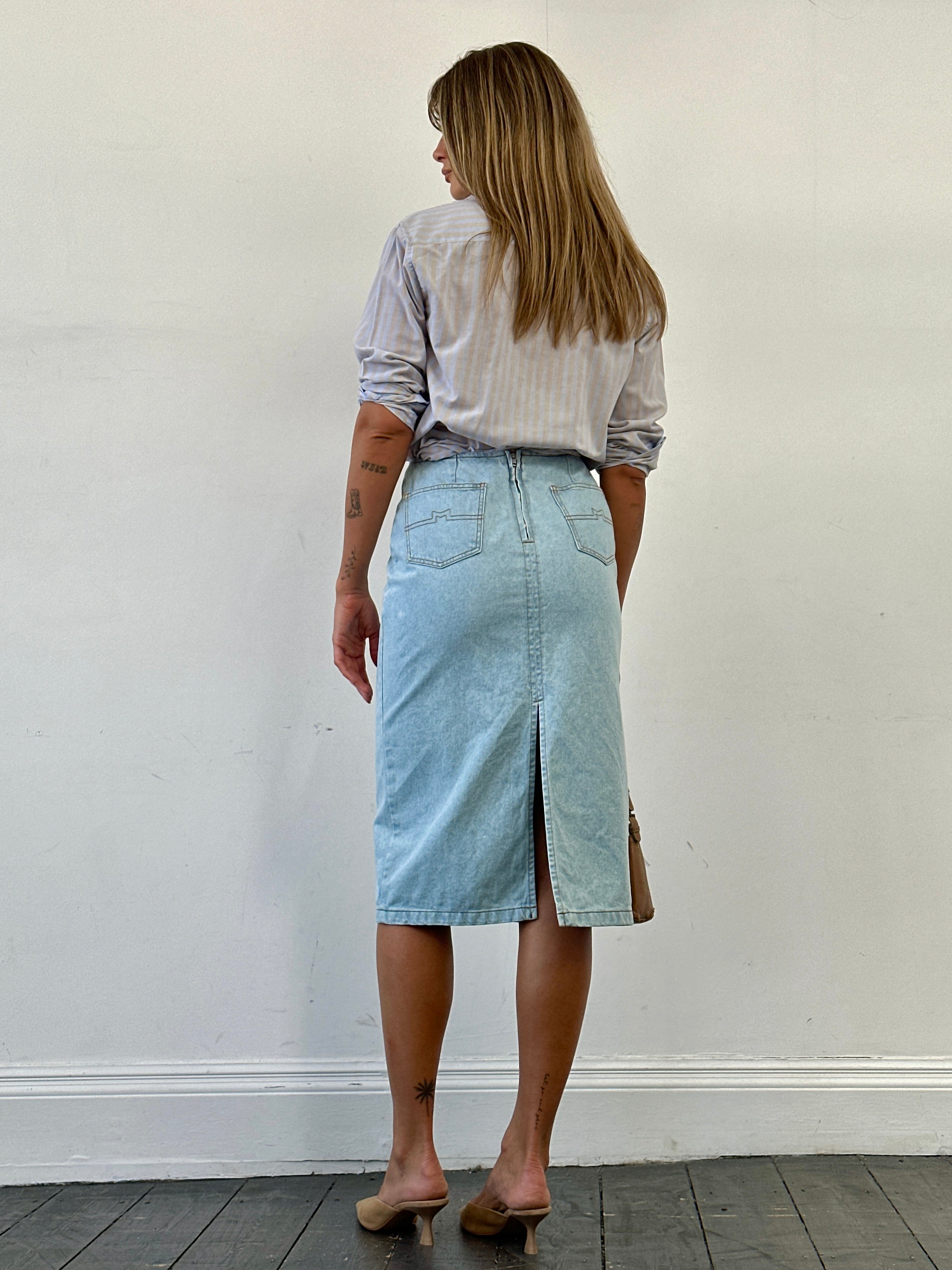 Max Mara pure cotton denim midi skirt in W26, featuring classic blue wash and sleek design, styled for casual or smart looks.