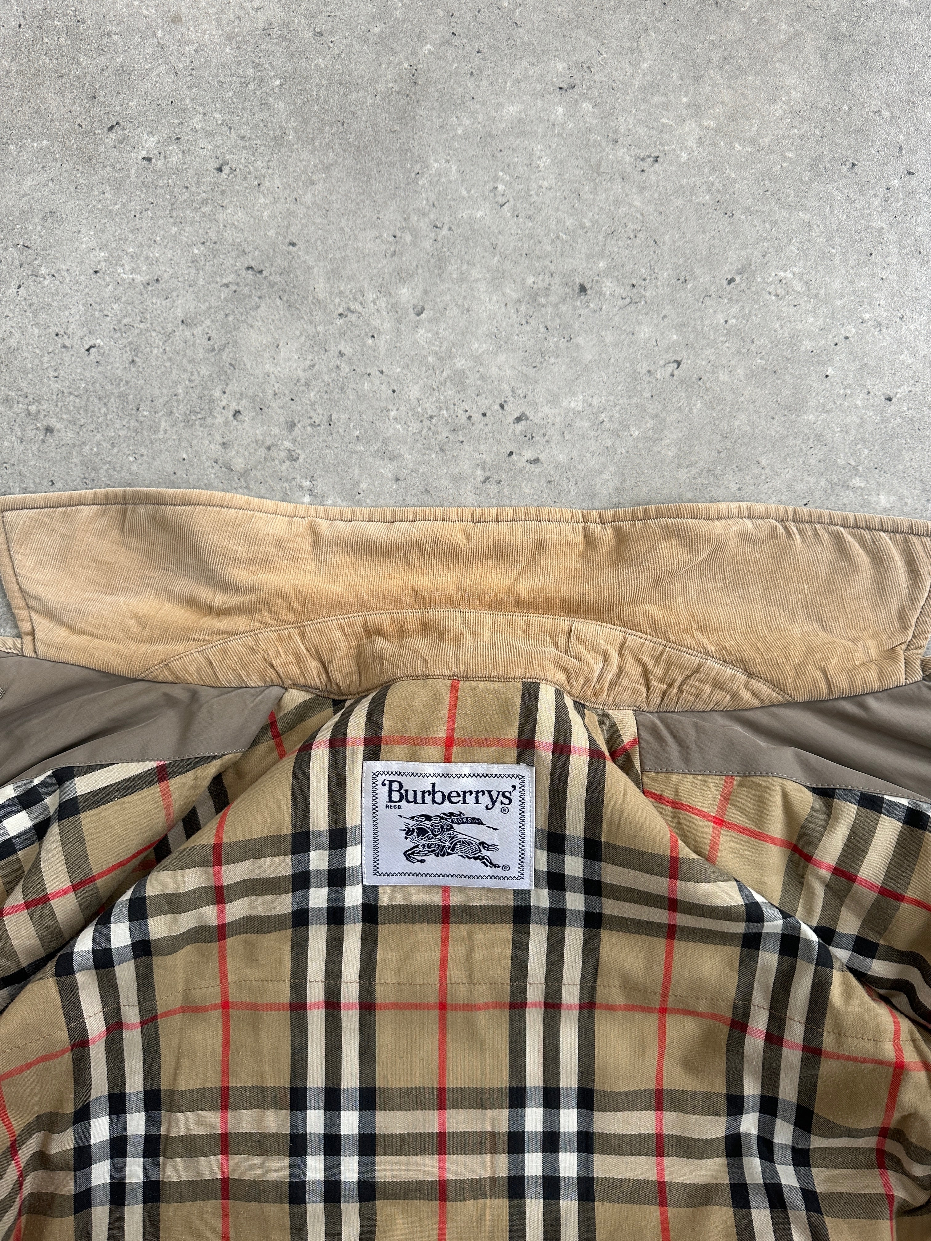 Burberry 1990s quilted Nova Check cord collar coat in size L, featuring classic plaid pattern and quilted fabric design.