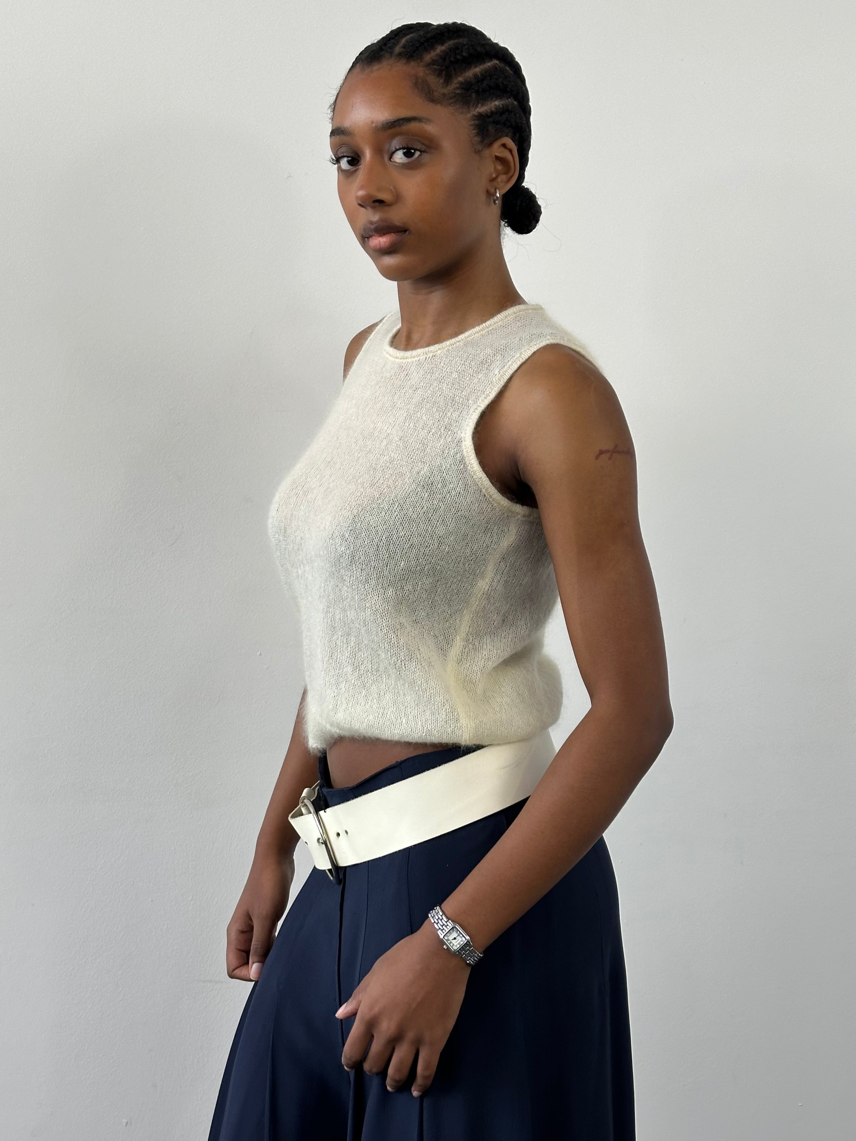Vintage Italian 1990s mohair knit top, size small, featuring a soft, textured fabric with a classic retro design.