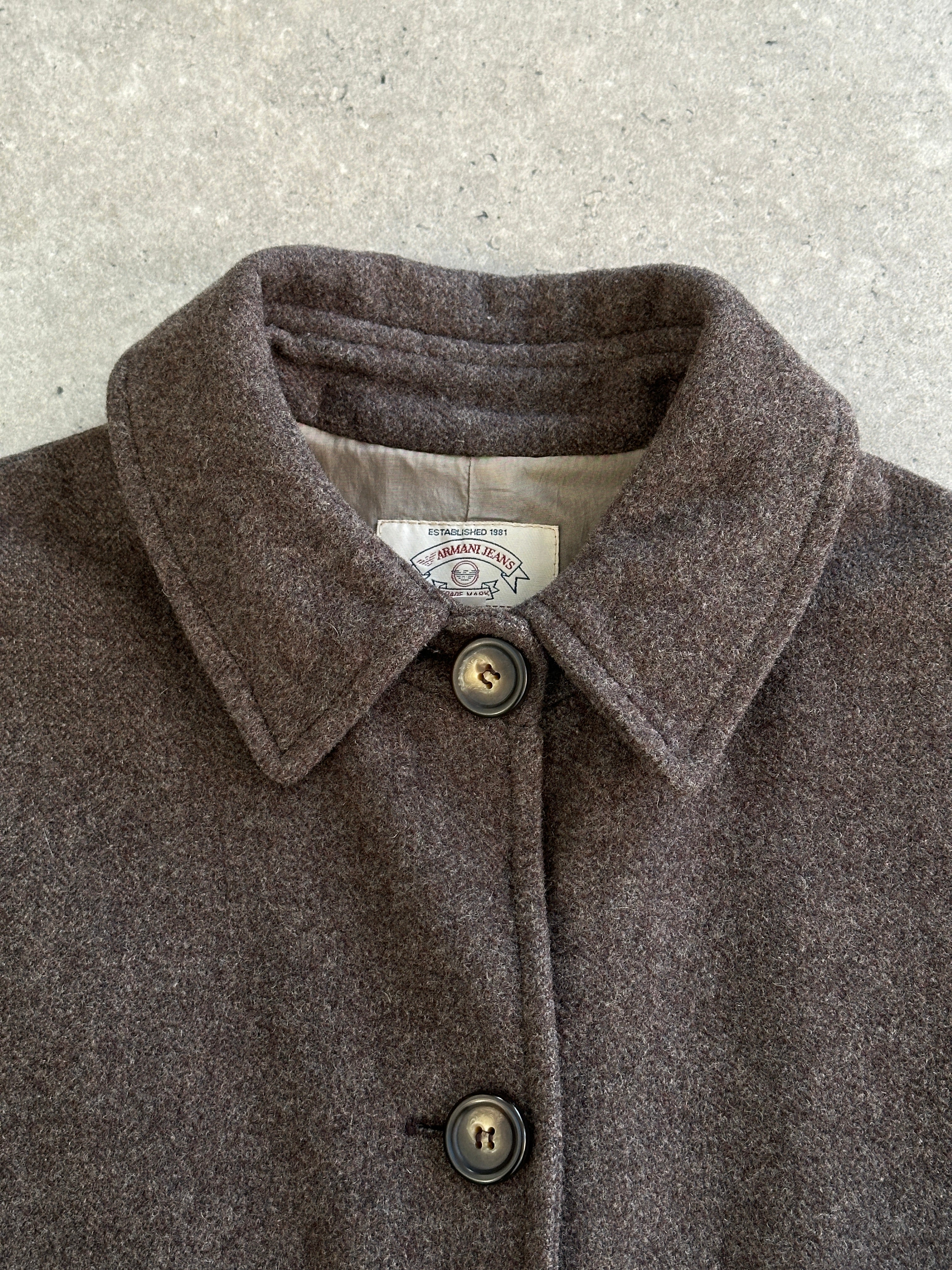 Armani Jeans pure virgin wool single-breasted coat in size L, displayed on a hanger with a neutral background.