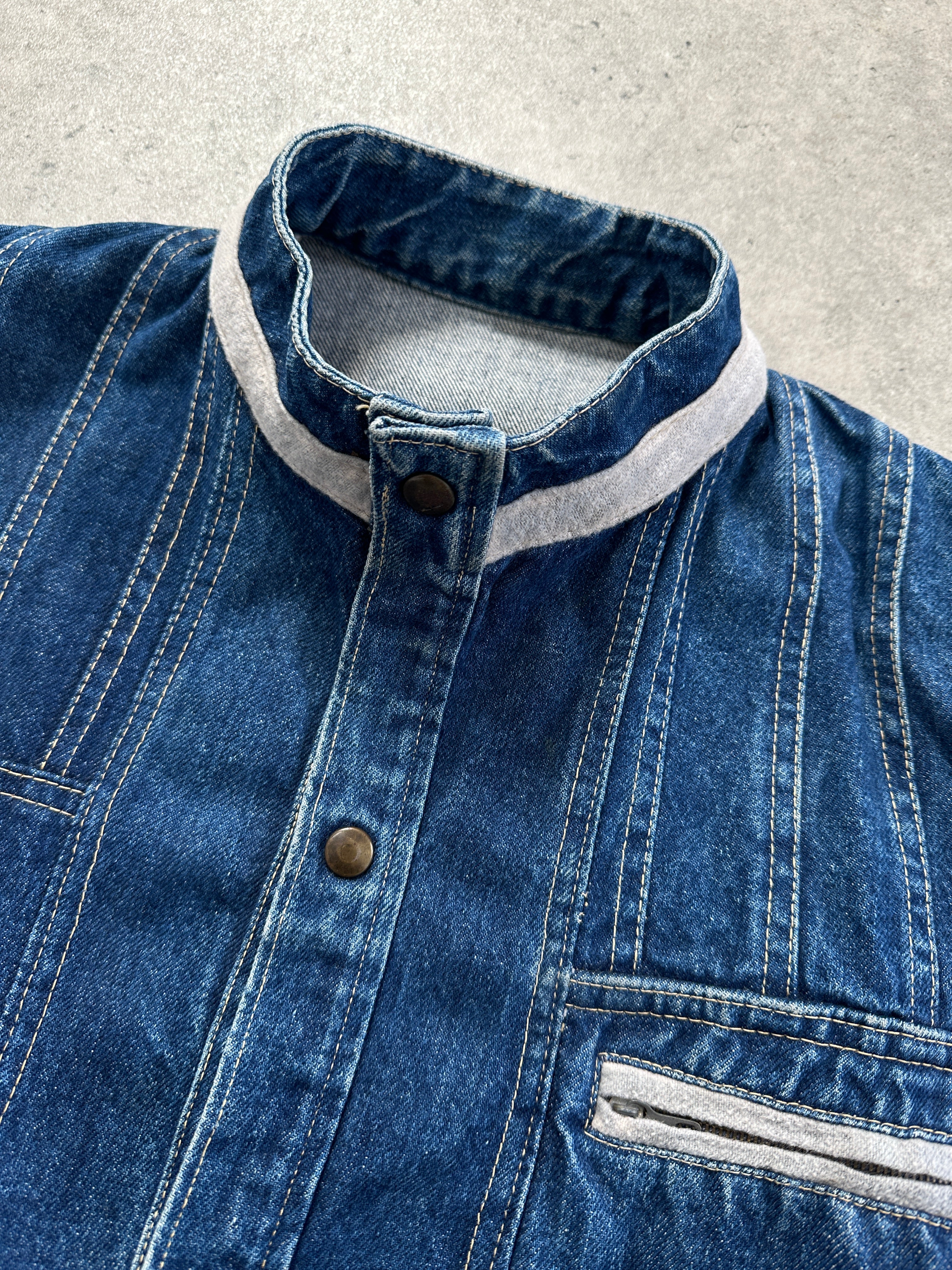 Vintage contrast stitch denim jacket in size small/medium, featuring classic design and detailed stitching, by Vintage.