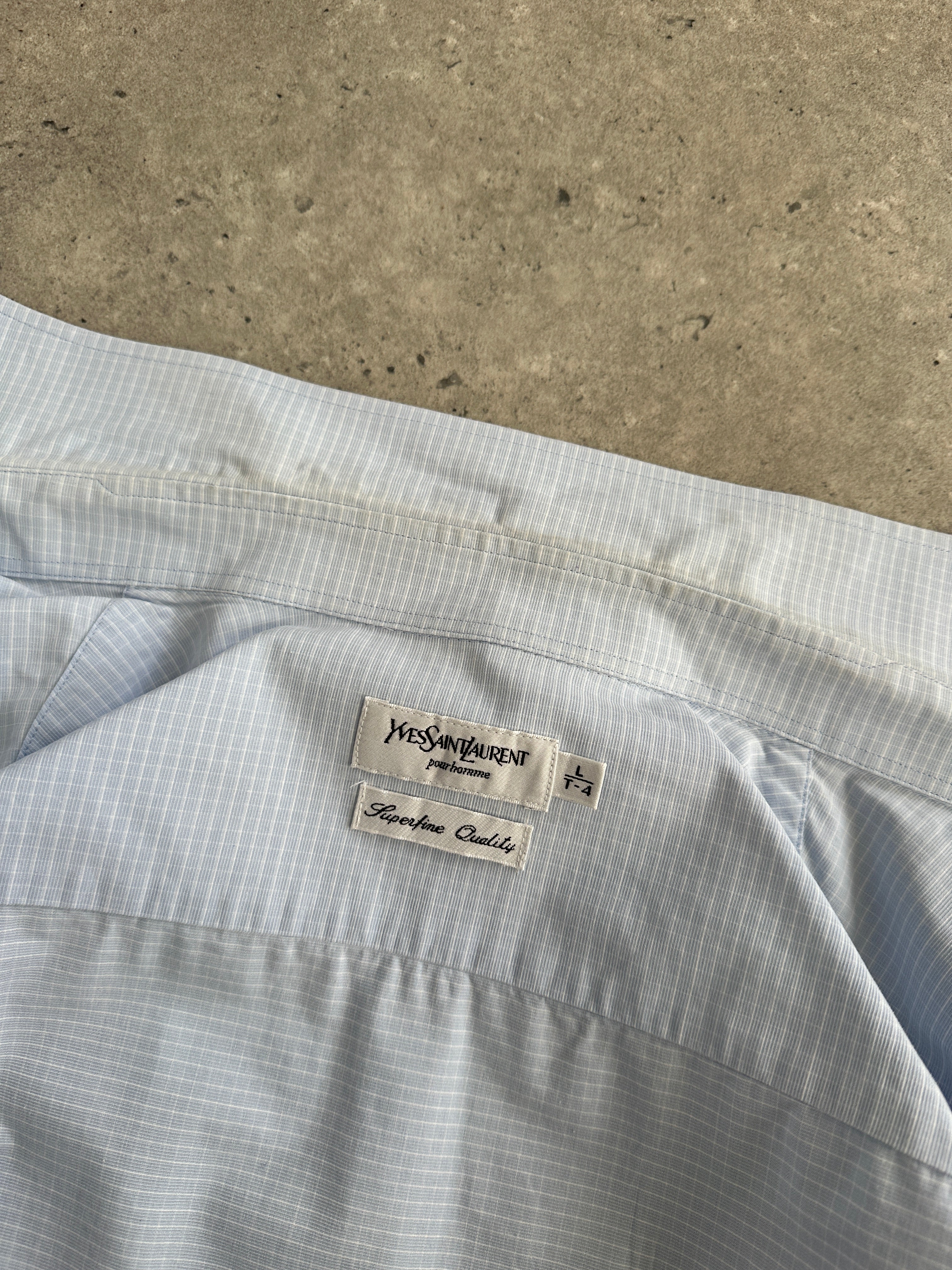 Yves Saint Laurent Pour Homme 1990s cotton check logo shirt in size L, featuring classic plaid pattern and brand logo detail.