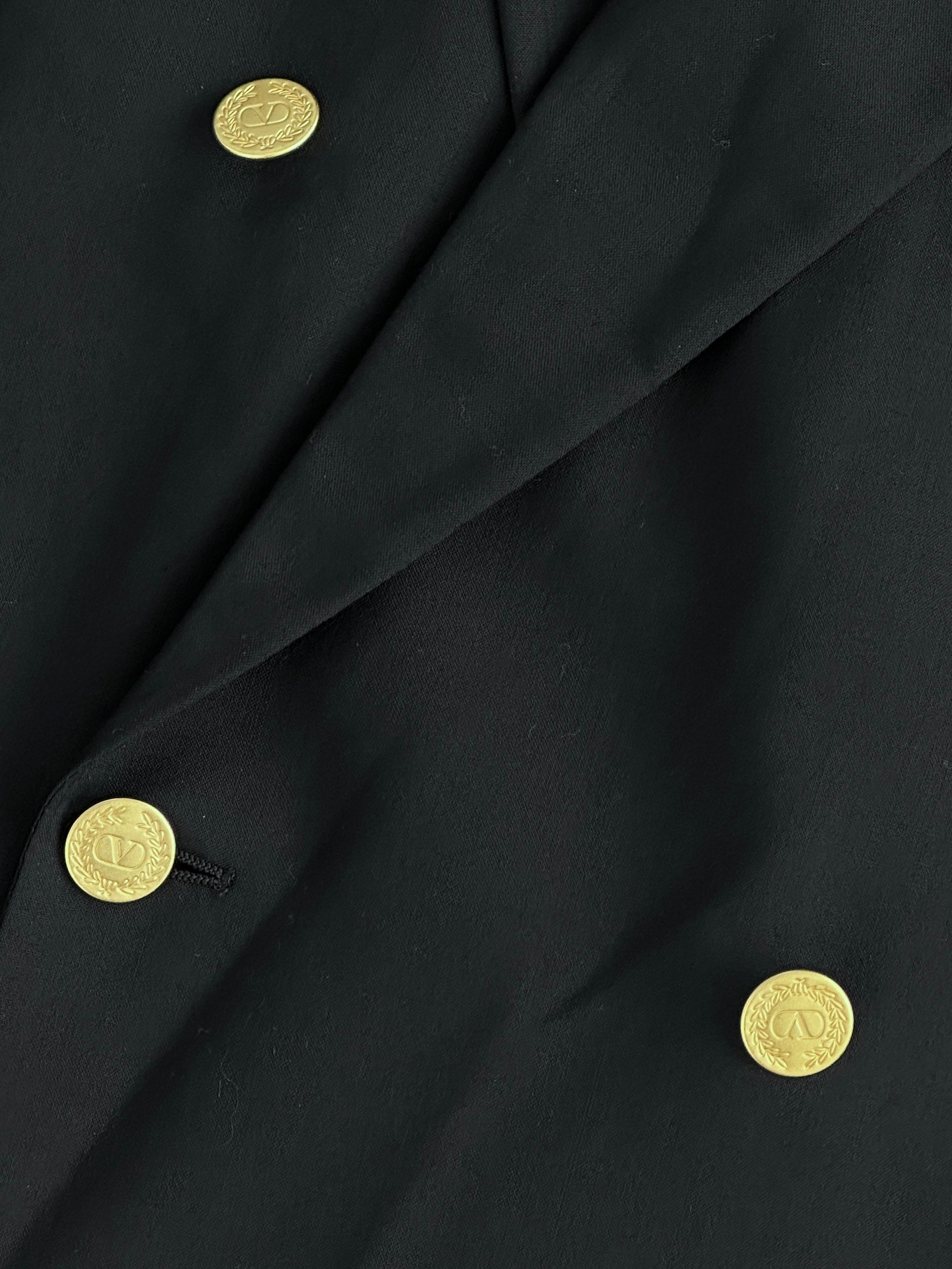 Valentino pure wool double-breasted blazer in size 42R/XL, tailored fit with classic lapels and button details, in a neutral color.