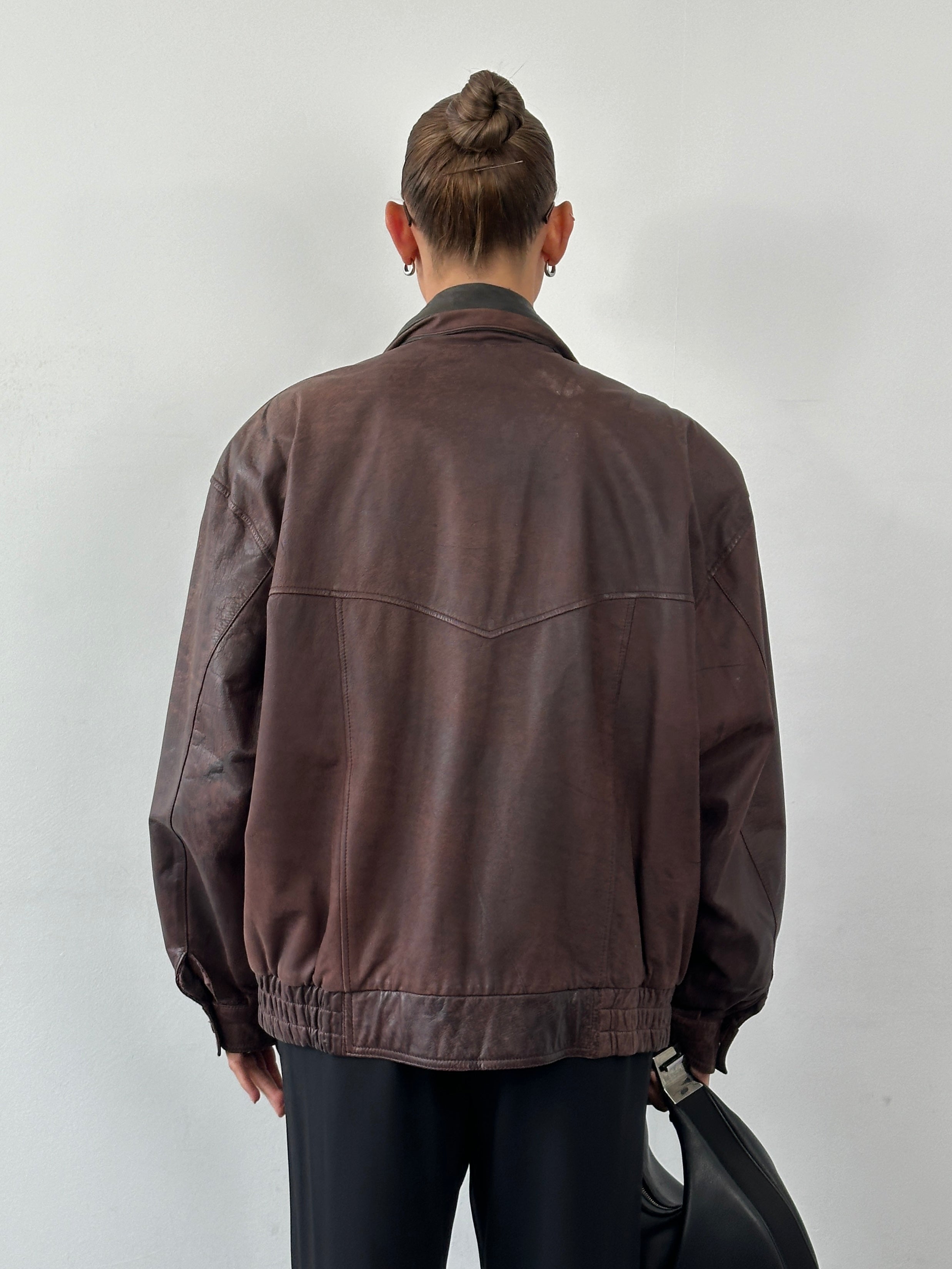 Vintage high neck mottled leather bomber jacket in XL, showcasing textured leather and classic design with ribbed cuffs and collar.