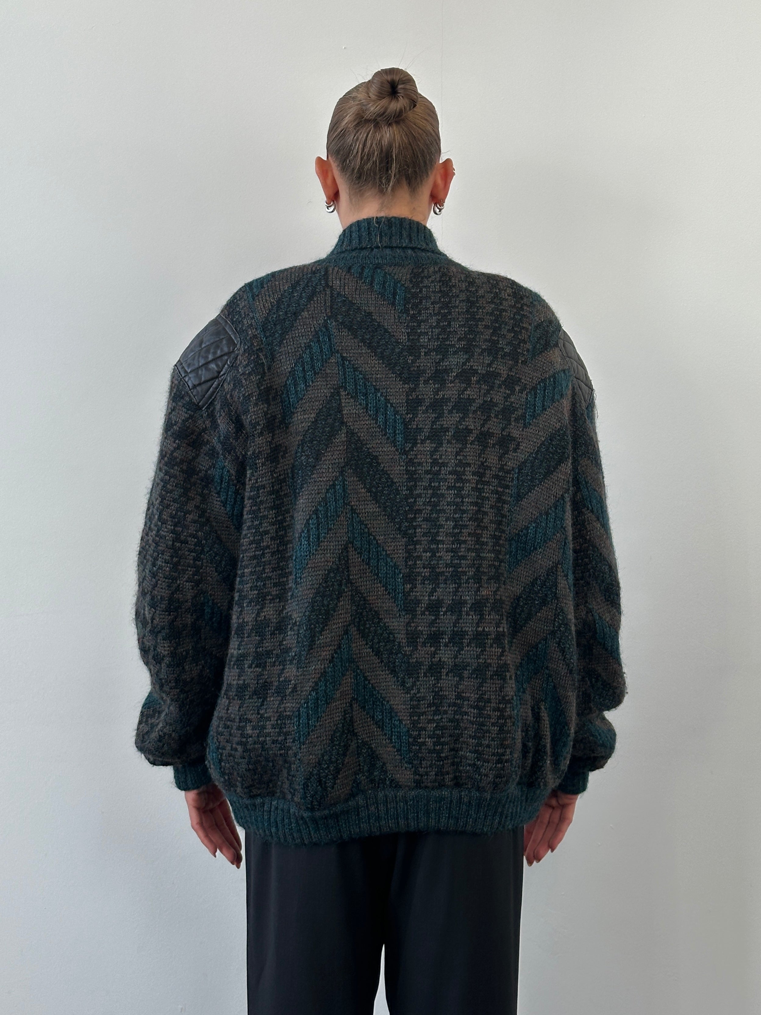 Vintage 1990s wool print knit bomber jacket in XL, featuring colorful retro patterns and classic bomber style.