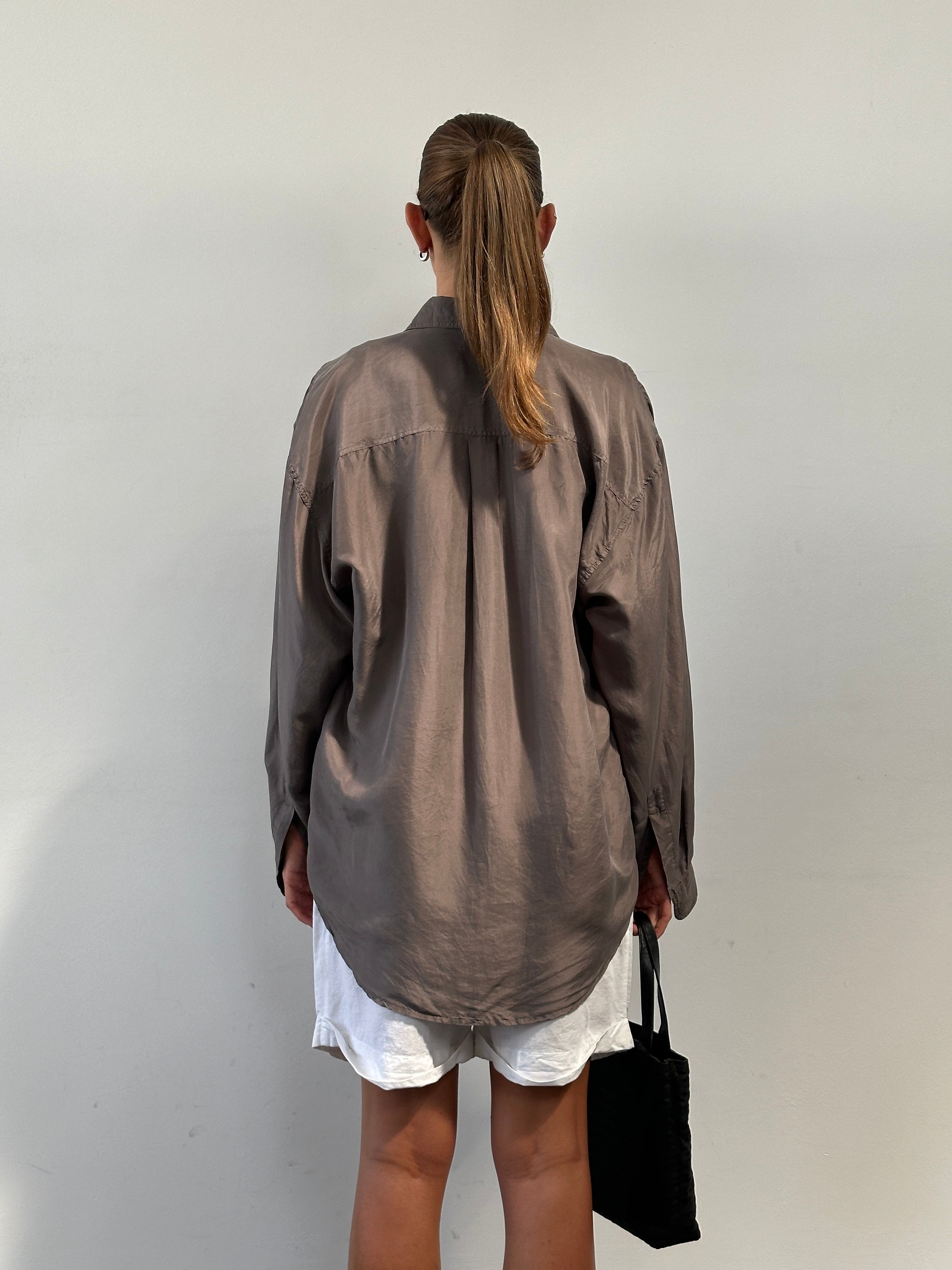 Vintage pure silk shirt in XL, showcasing a smooth, shiny fabric with a classic collar and button-down front.